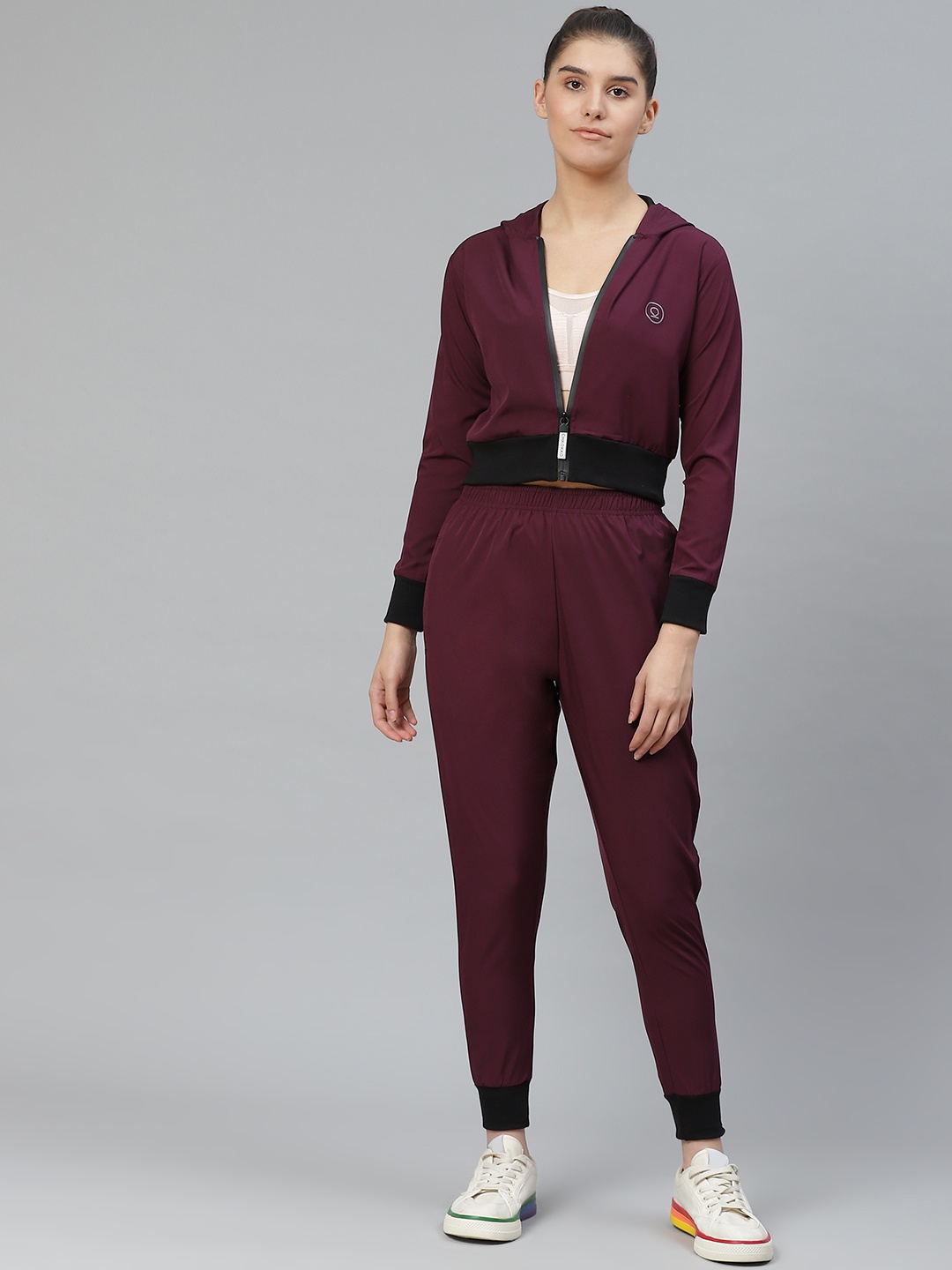 

Chkokko Women Burgundy Solid Training Tracksuit