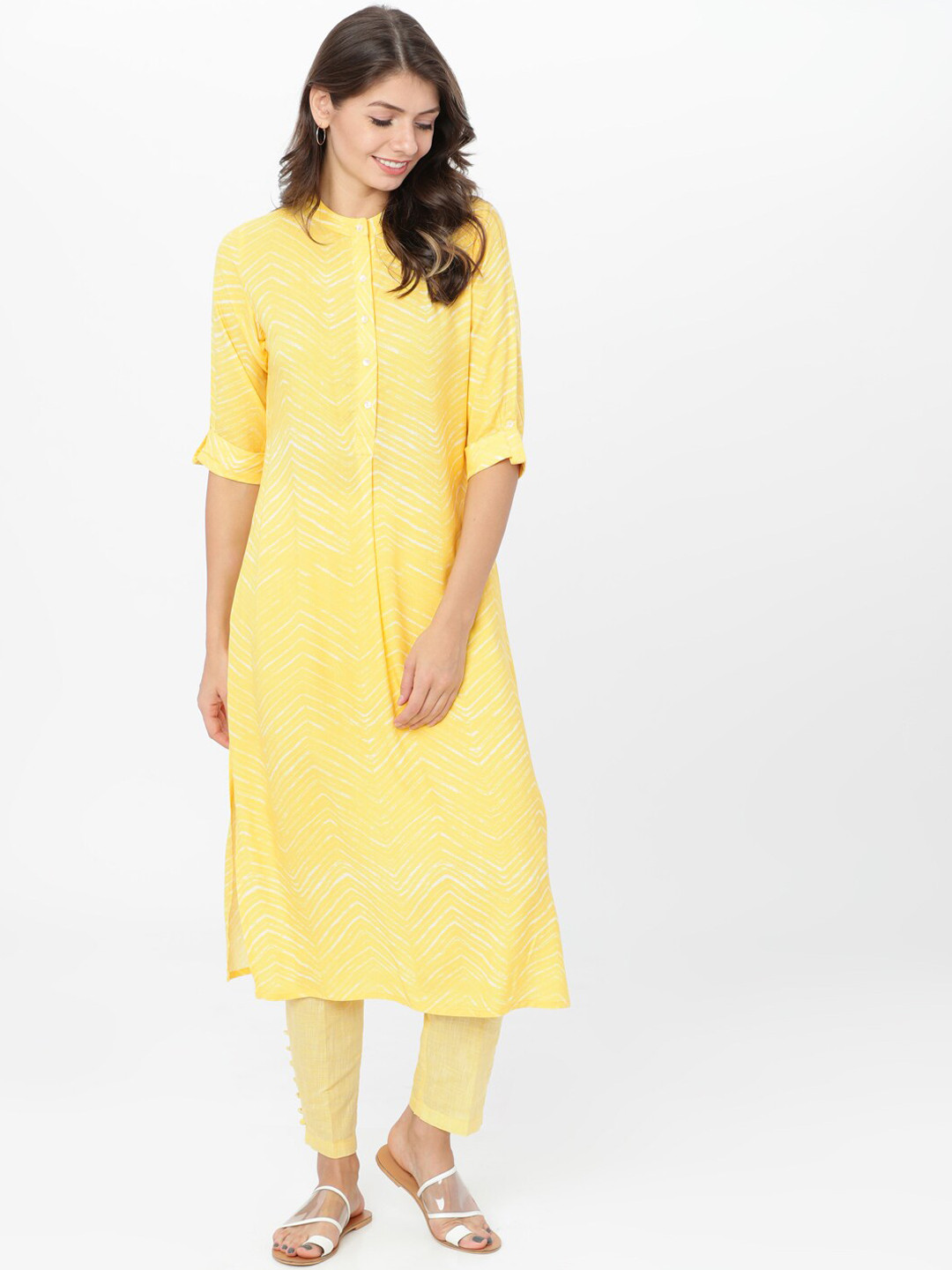

Vishudh Women Yellow Printed Kurta with Trousers