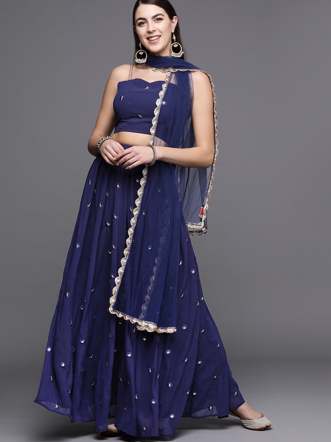 

Inddus Navy Blue & Golden Embroidered Semi-Stitched Lehenga & Blouse with Dupatta
