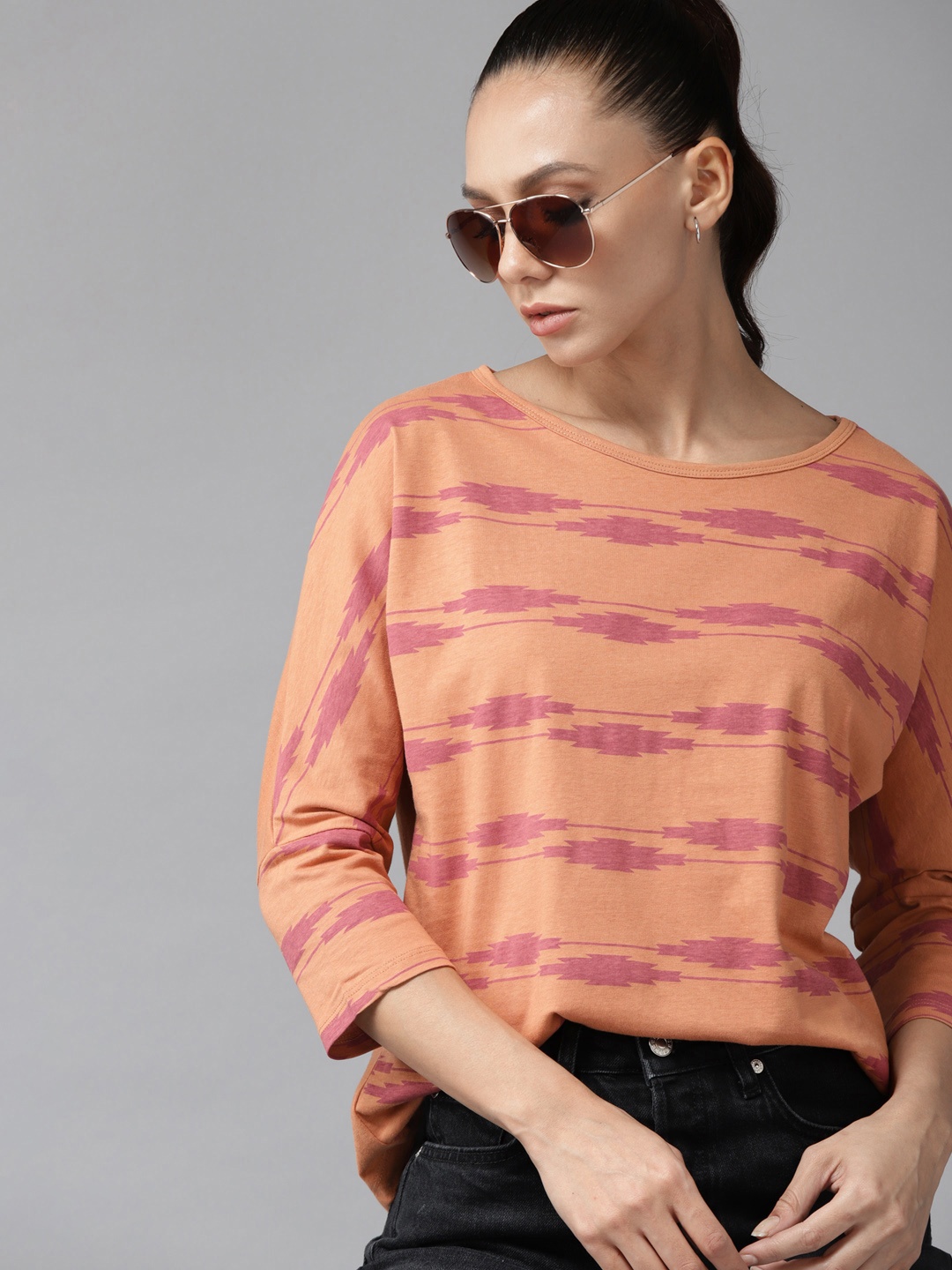 

Roadster Women Peach-Coloured & Purple Printed Extended Sleeves Pure Cotton T-shirt