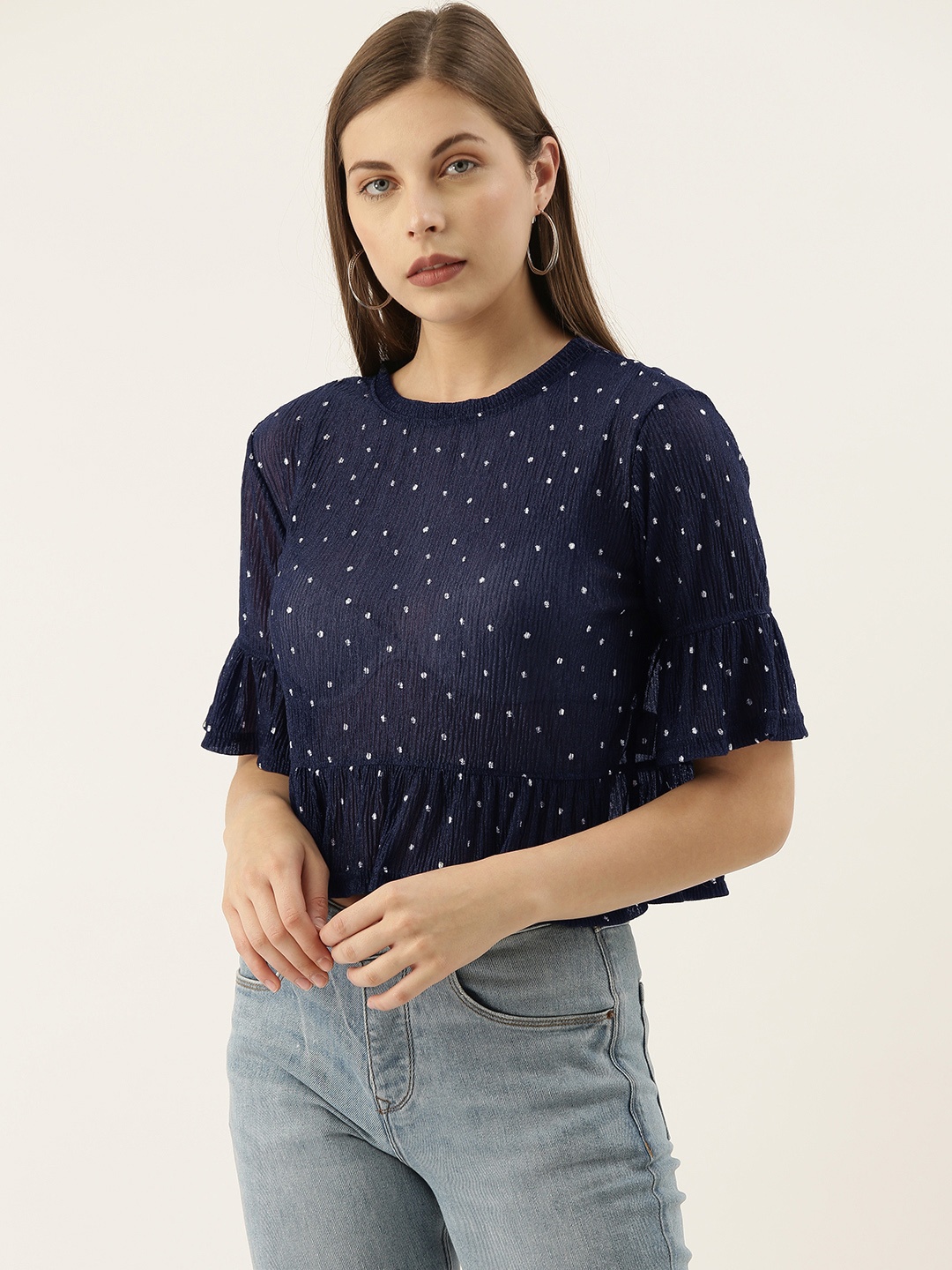

Campus Sutra Navy Blue & White Geometric Printed Bell Sleeves Semi Sheer Crop Top