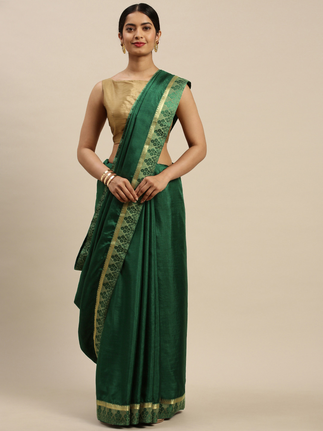 

Indian Women Green Solid Saree