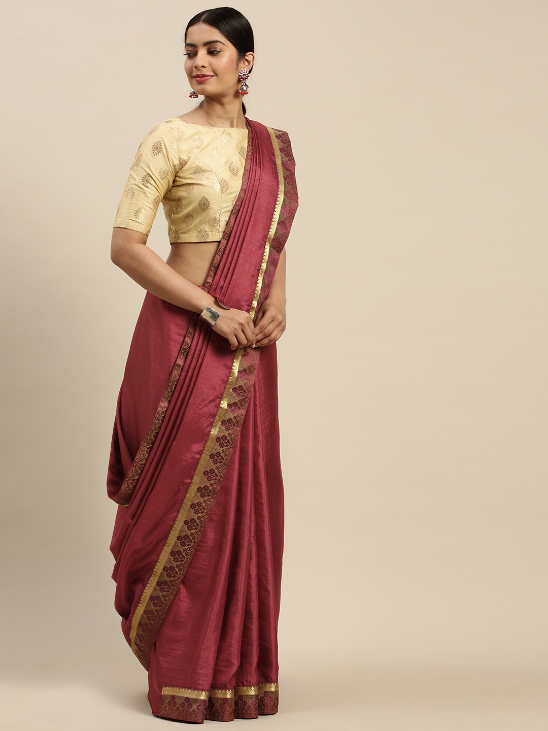 

Indian Women Burgundy Solid Saree