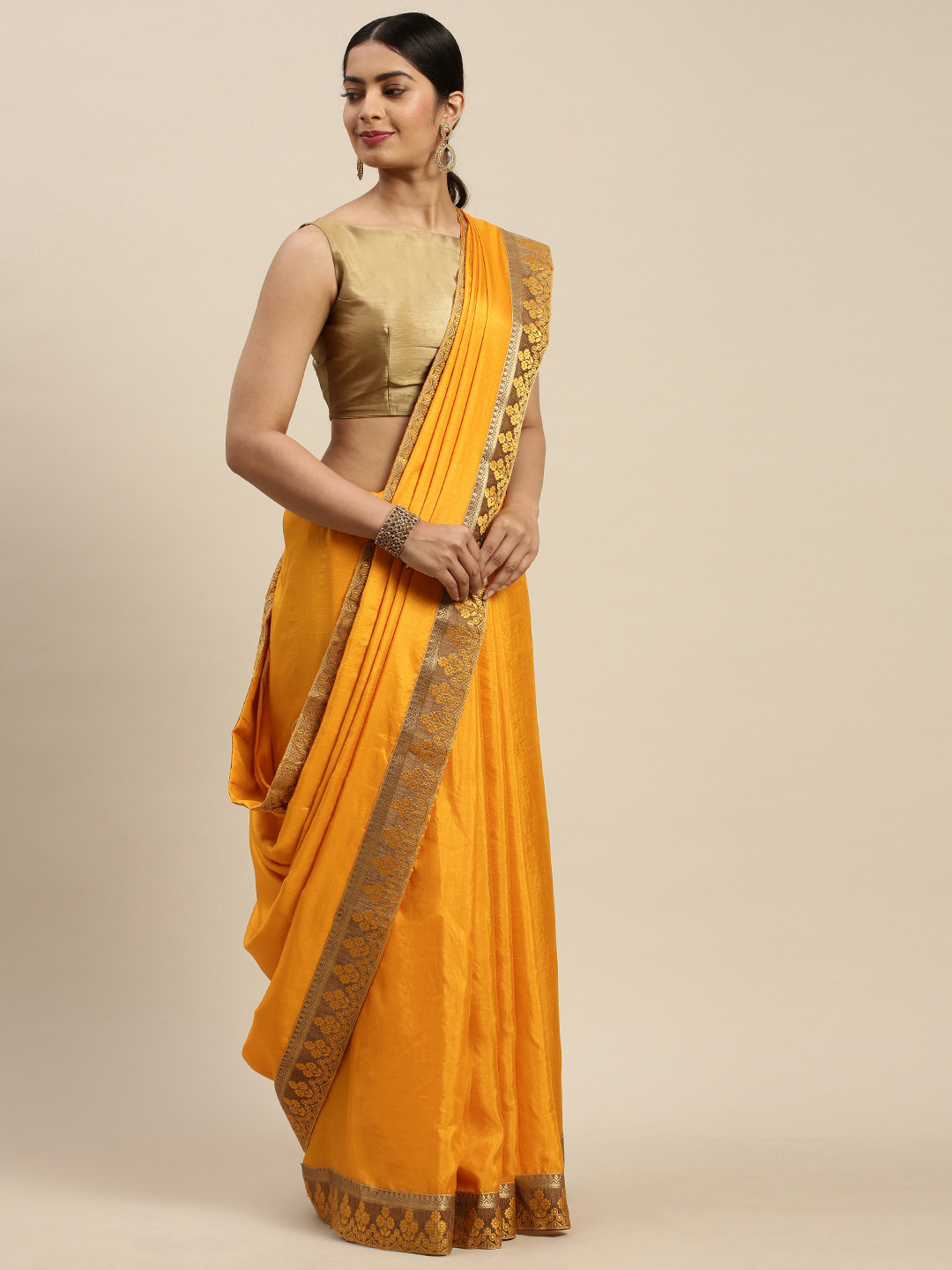 

Indian Women Mustard Solid Ready to Wear Saree