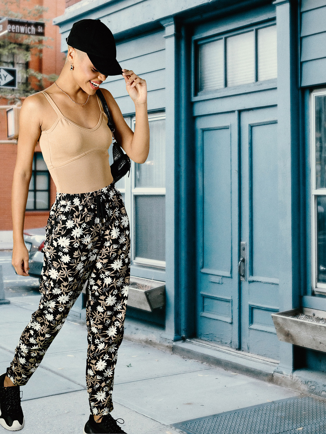 

Marks & Spencer Women Black & White Tapered Fit Floral Printed Regular Trousers