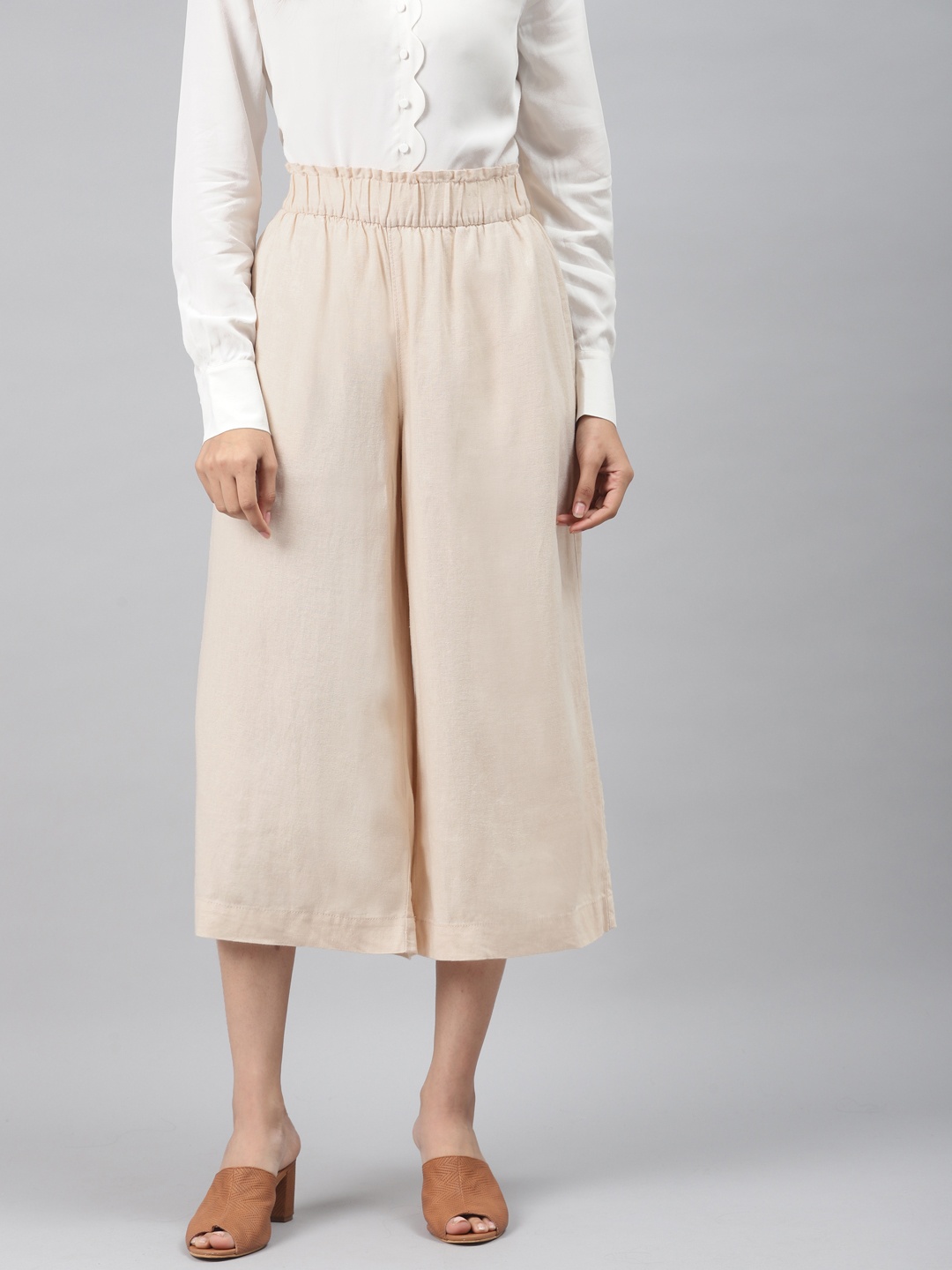 

Marks & Spencer Women Peach-Coloured Flared Solid Culottes