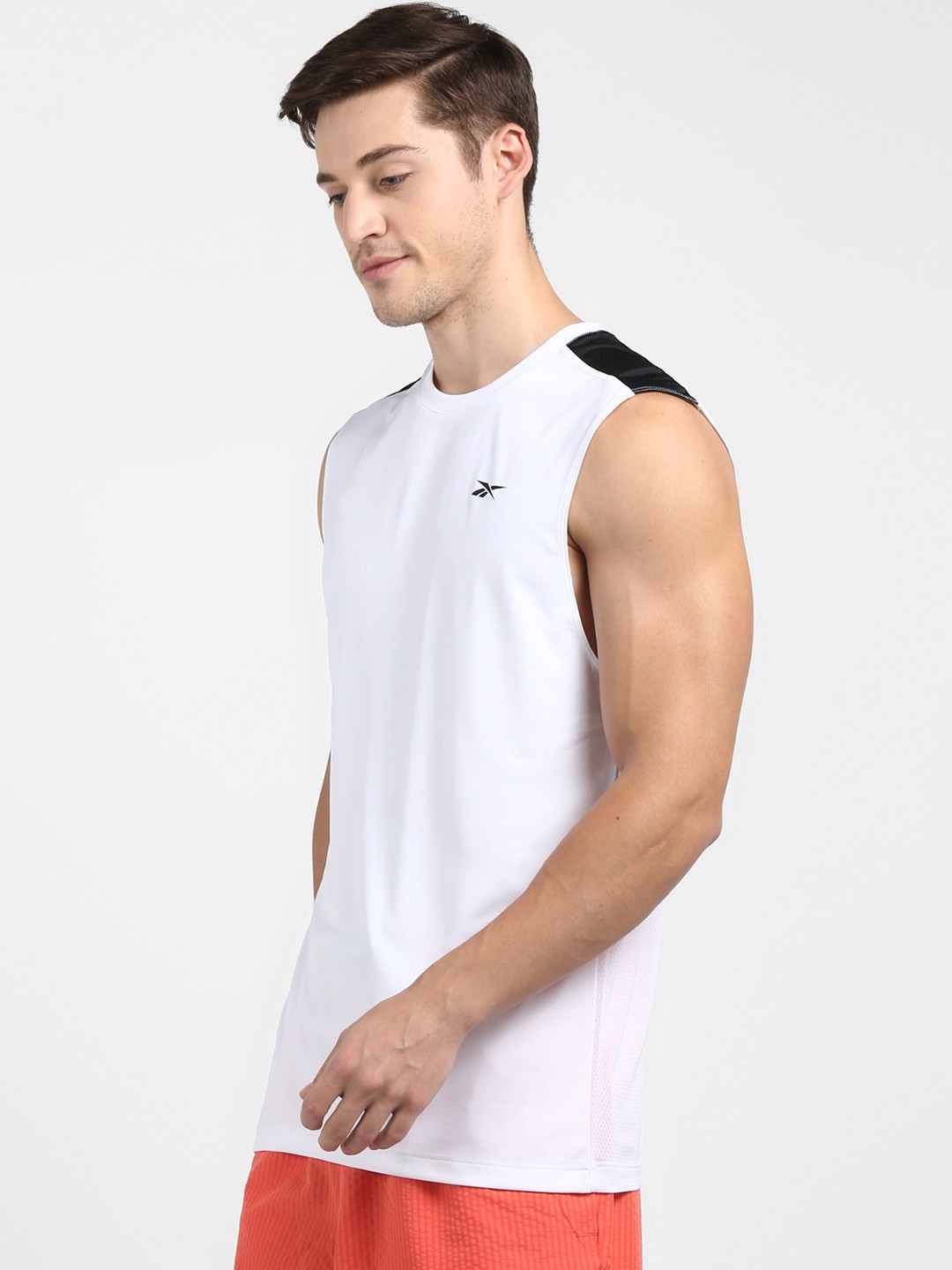 

Reebok Men White Solid Sustainable Training Workout Ready Sleeveless Tech Tee