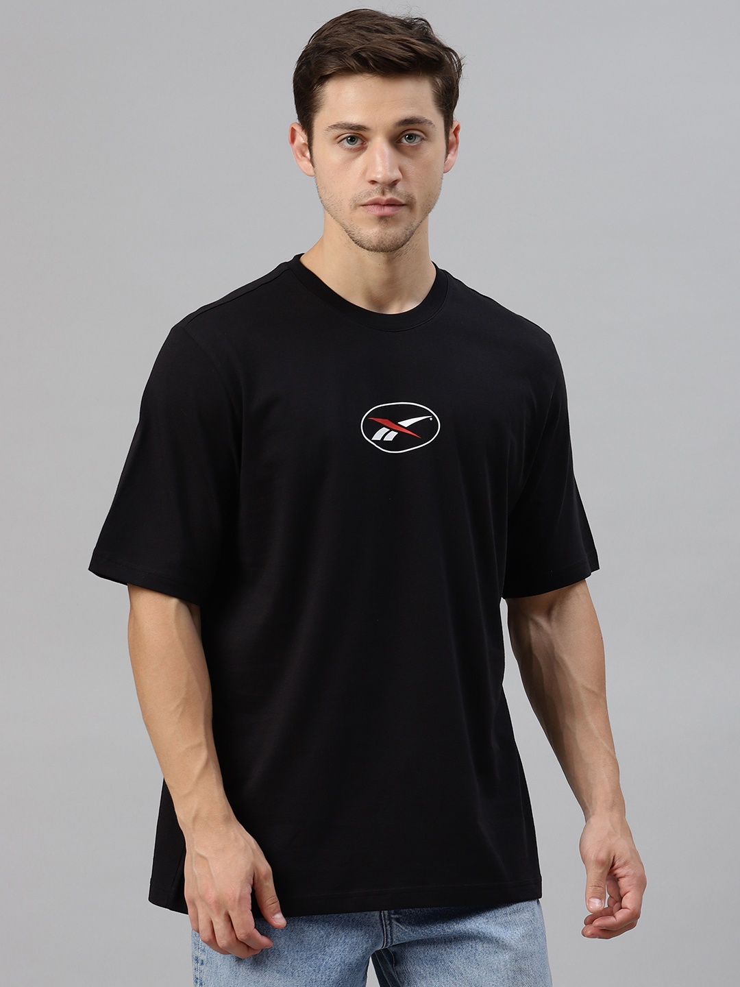 

Reebok Classic Unisex Black Glitch Brand Logo Printed Back Round Neck T-shirt