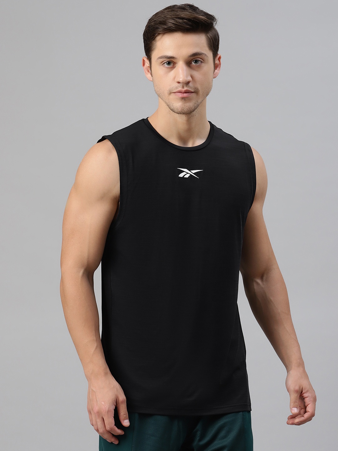 

Reebok Men Black Training Activchill Sleeveless Solid Round Neck T-shirt