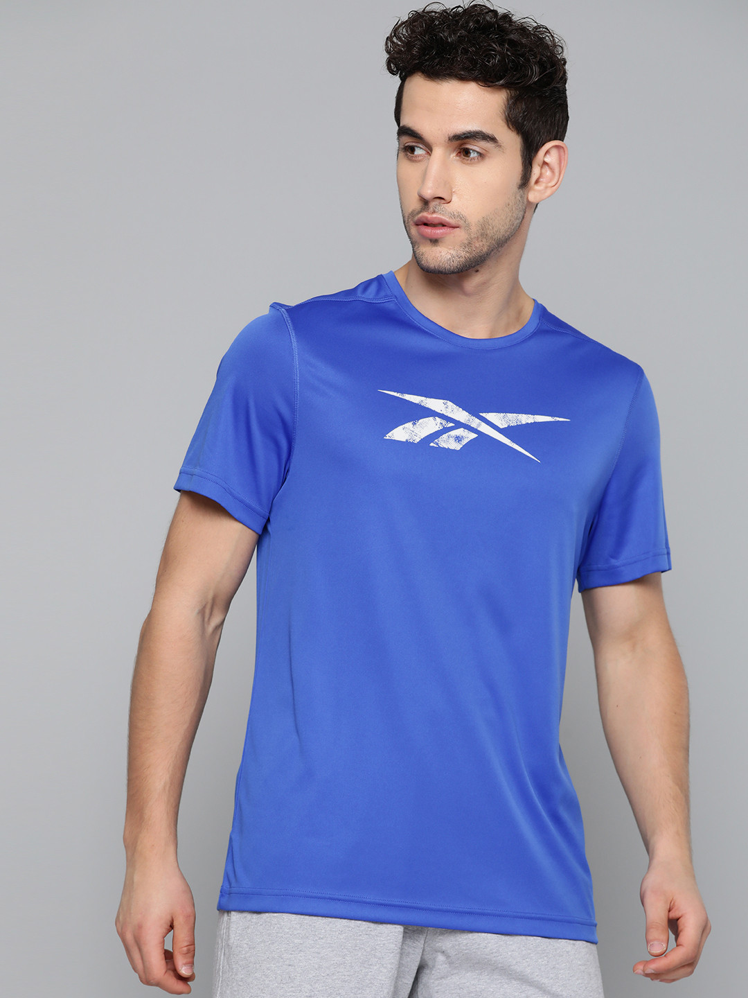 

Reebok Men Blue Work Out Ready Poly Graphic Training T-Shirt