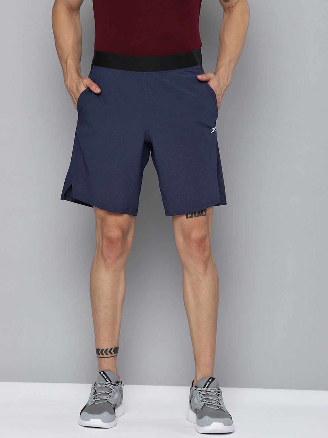 

Reebok Men Navy Blue Solid Speedwick Training Epic Sports Shorts