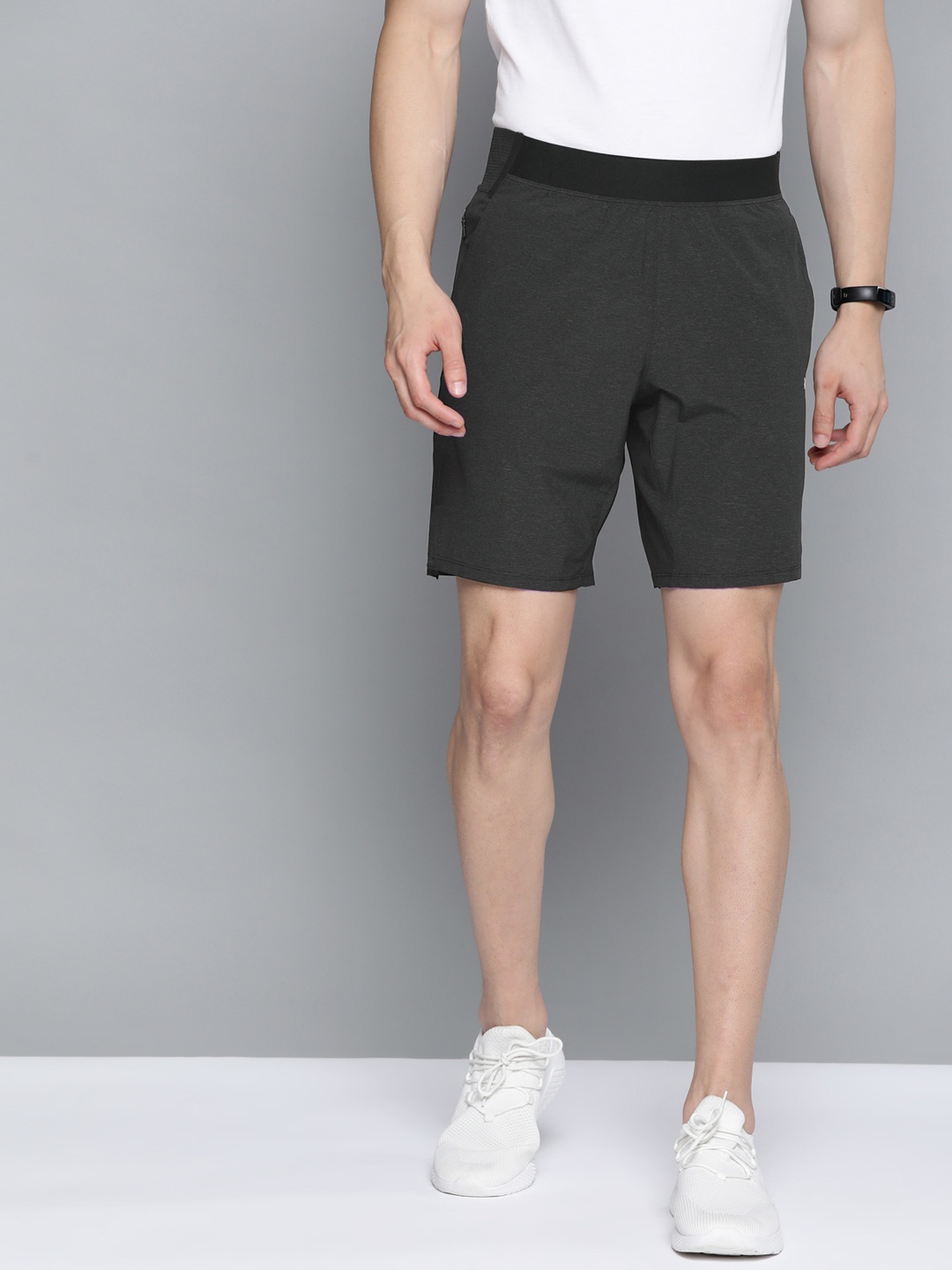 

Reebok Men Black Solid TS Epic REECYCLED + SPEEDWICK Short