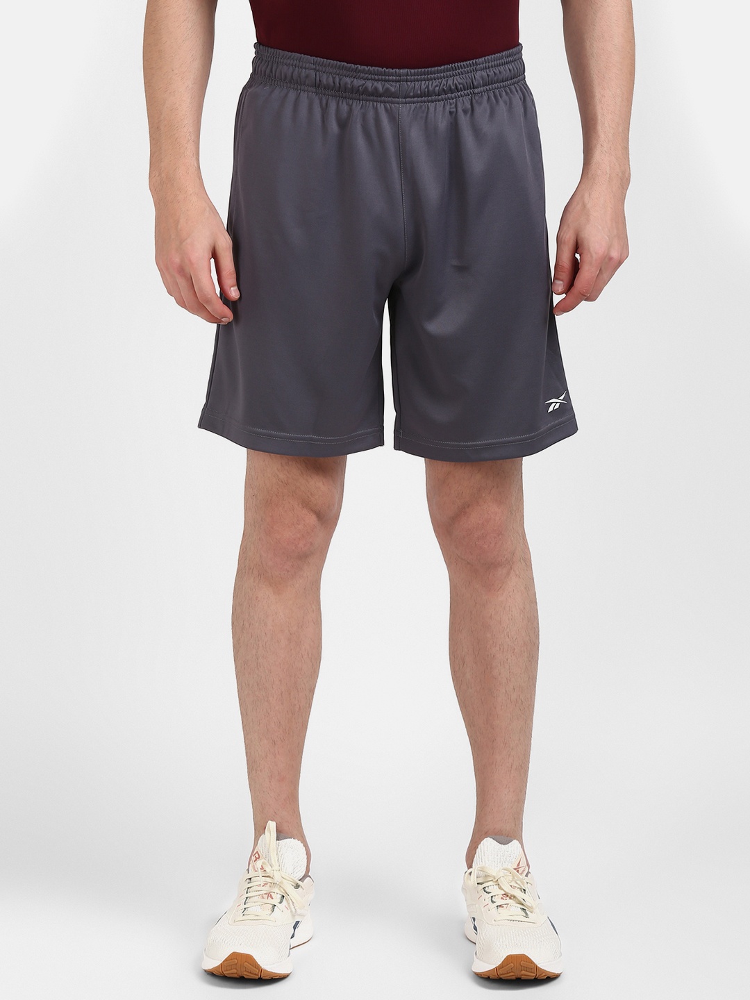 

Reebok Men Grey Solid Training Foundation Poly Knit Shorts