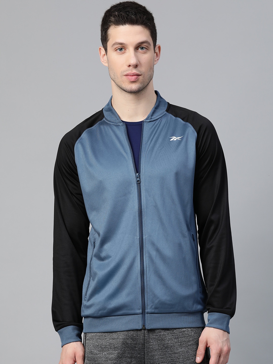 

Reebok Men Blue Printed Training Hustle Track Jacket