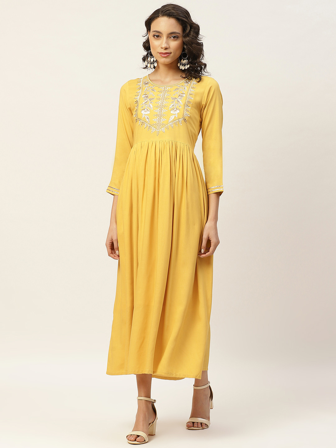 

Shae by SASSAFRAS Women Yellow Solid A-Line Dress