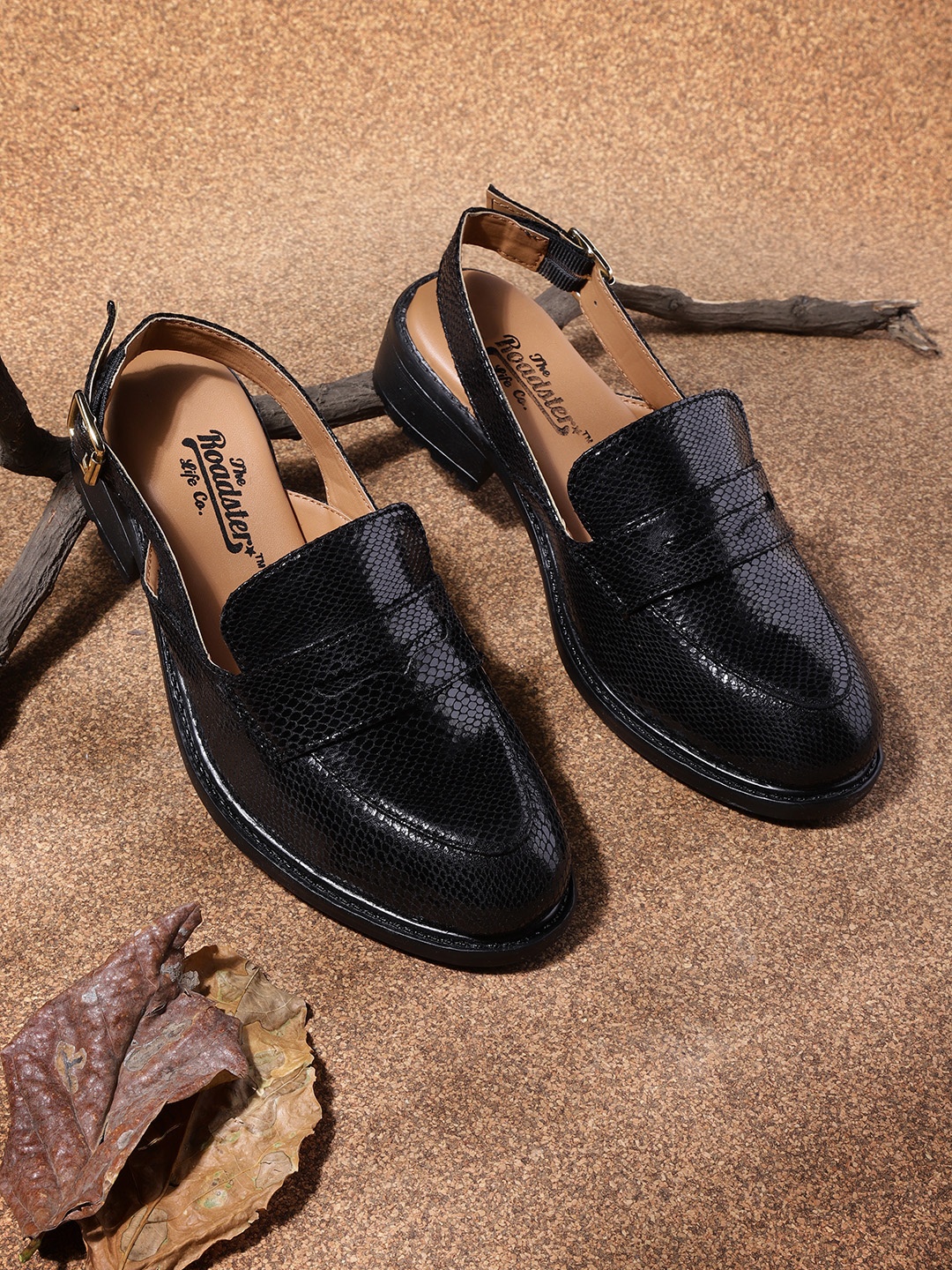 

The Roadster Lifestyle Co Women Black Snakeskin Textured Mules with Penny Pocket