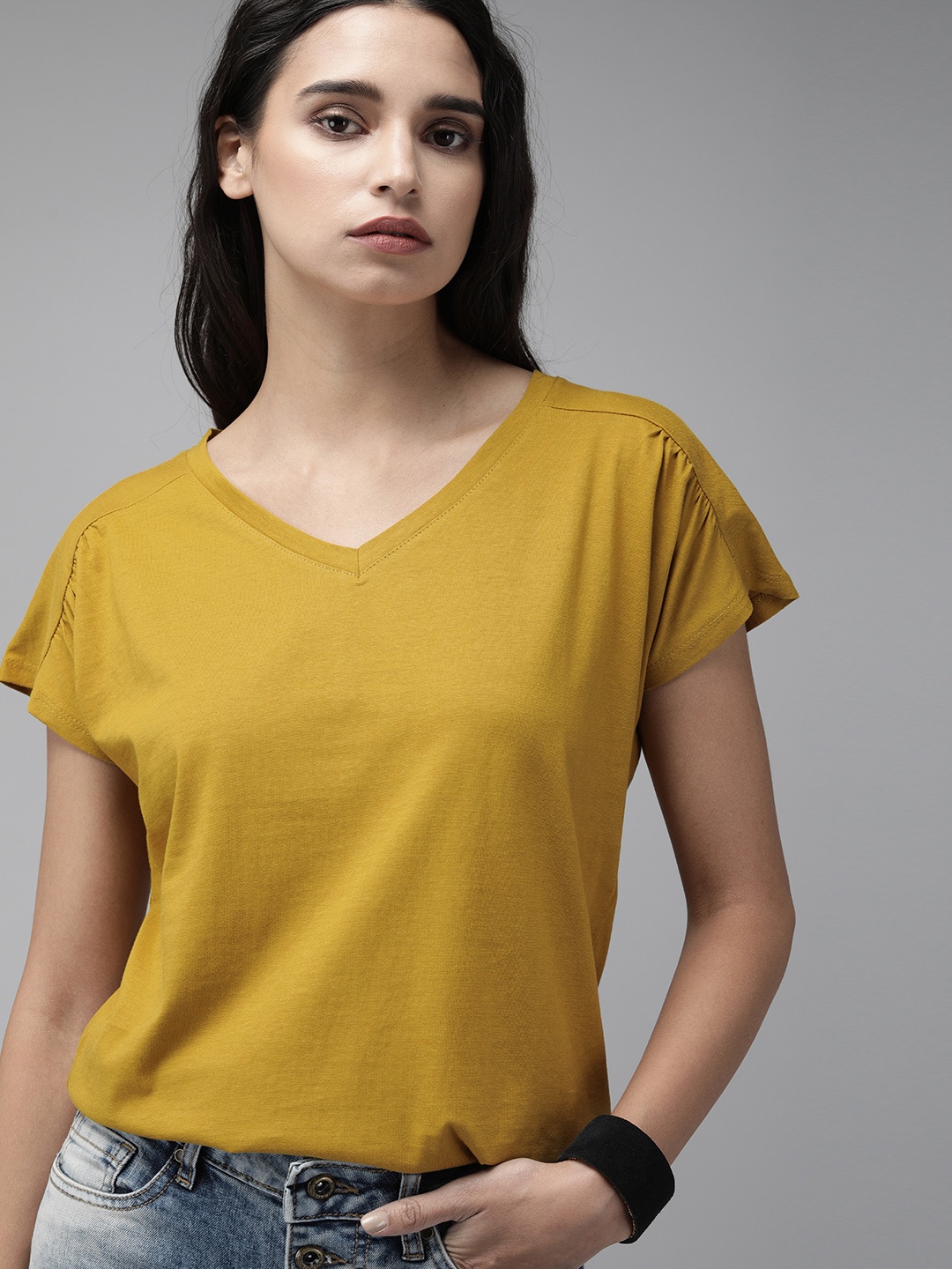 

Roadster Women Mustard Pure Cotton Solid V-Neck T-shirt