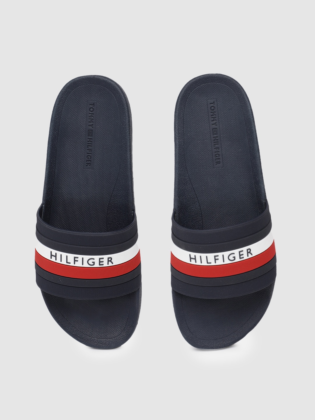 

Tommy Hilfiger Men Navy Blue & Red Striped Sliders