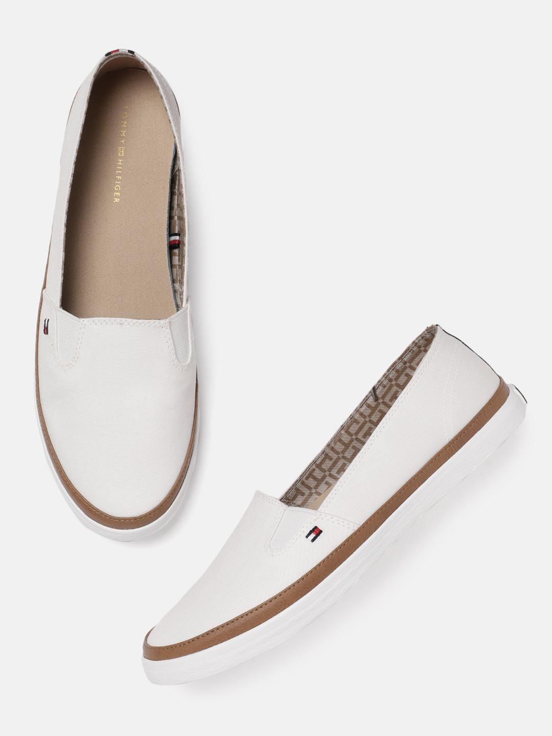 

Tommy Hilfiger Women White Solid ICONIC KESHA Slip-On Sneakers