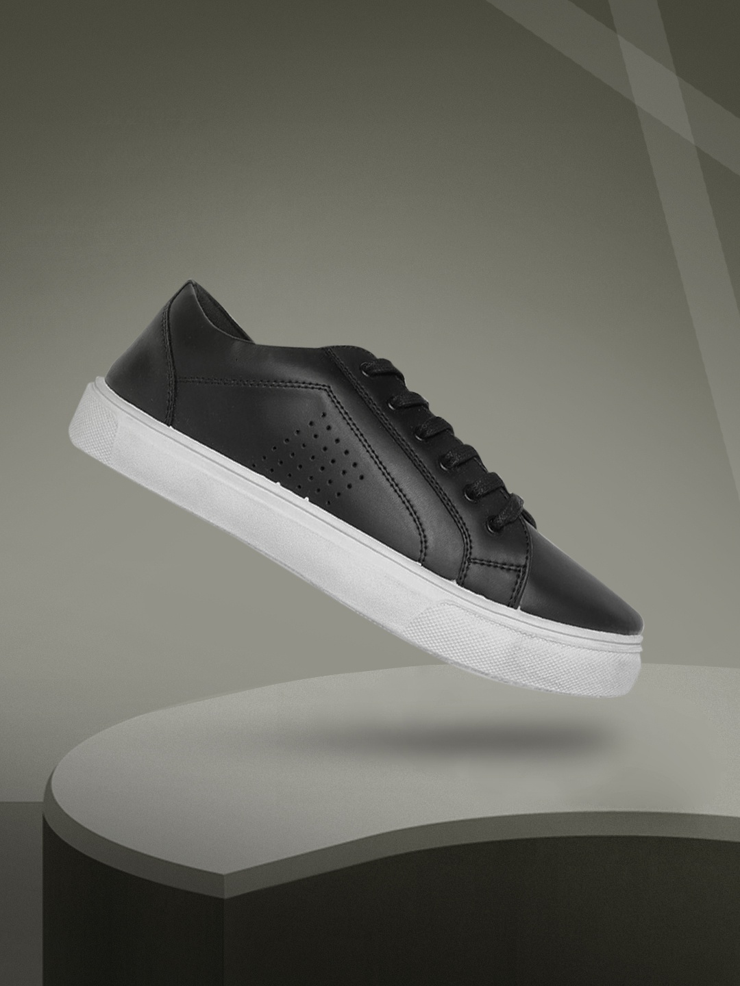 

The Roadster Lifestyle Co Men Black Solid Perforated Detail Sneakers