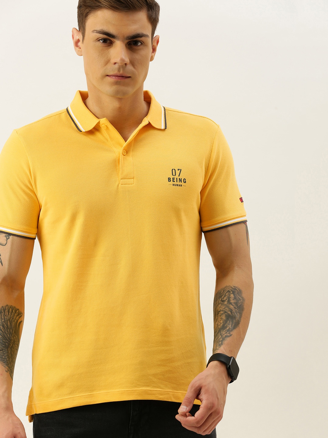 

Being Human Men Yellow Solid Polo Collar Pure Cotton T-shirt