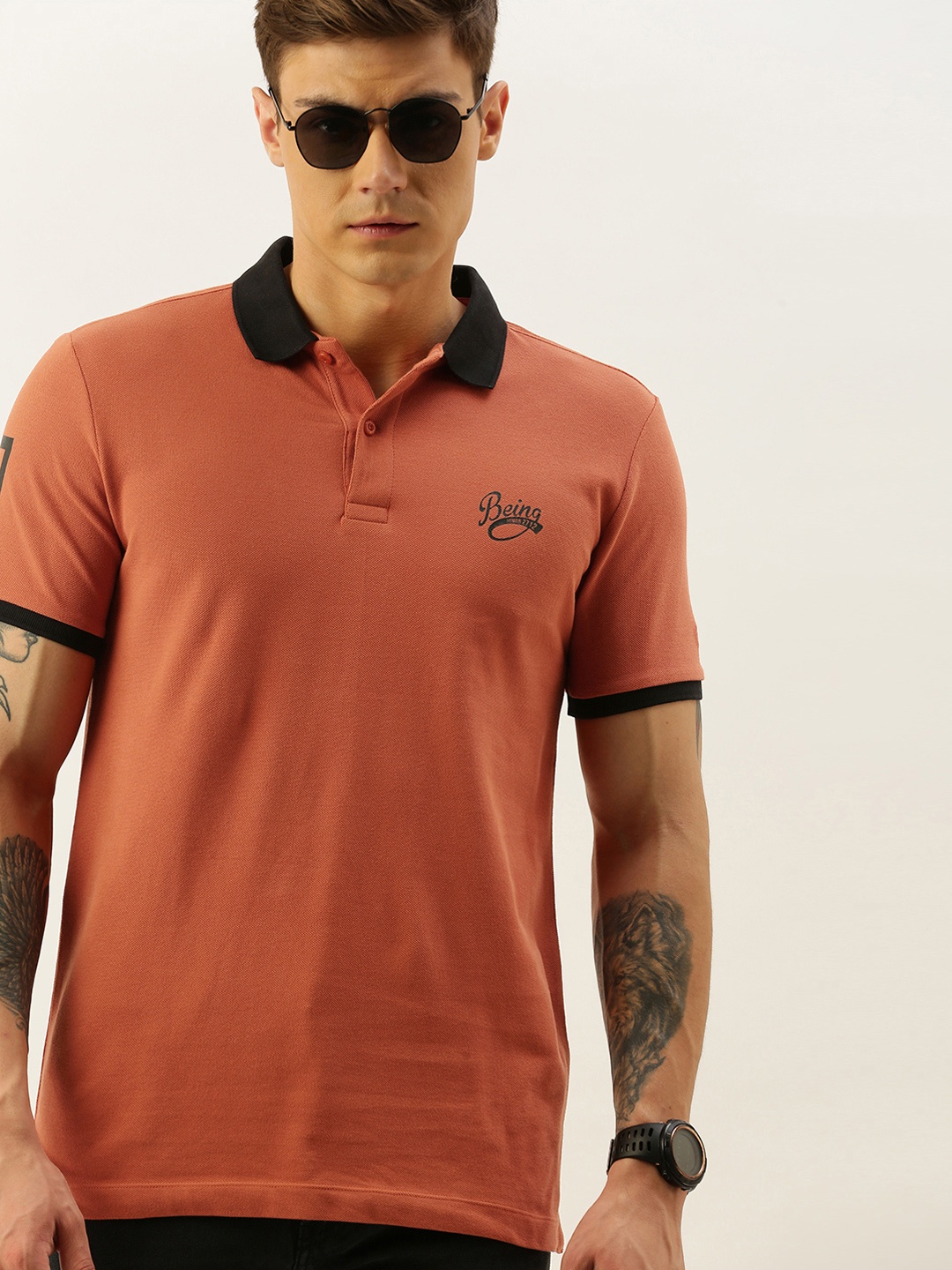 

Being Human Men Orange Solid Polo Collar Pure Cotton T-shirt