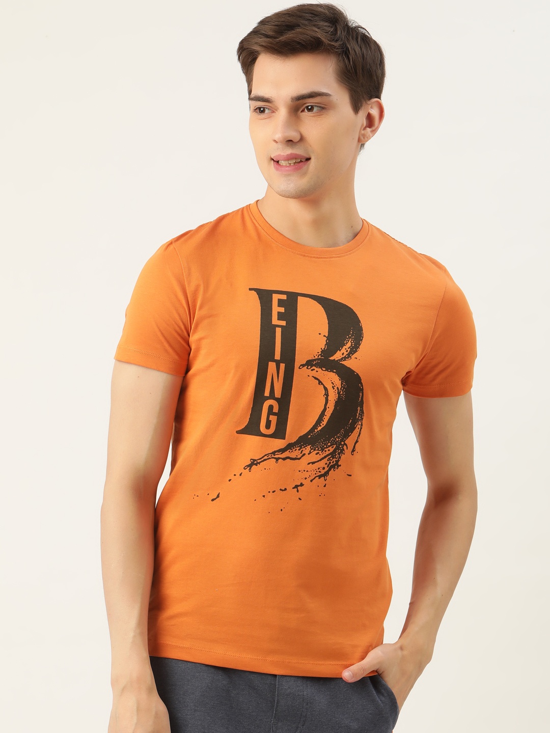 

Being Human Men Orange Black Printed Round Neck Pure Cotton T-shirt