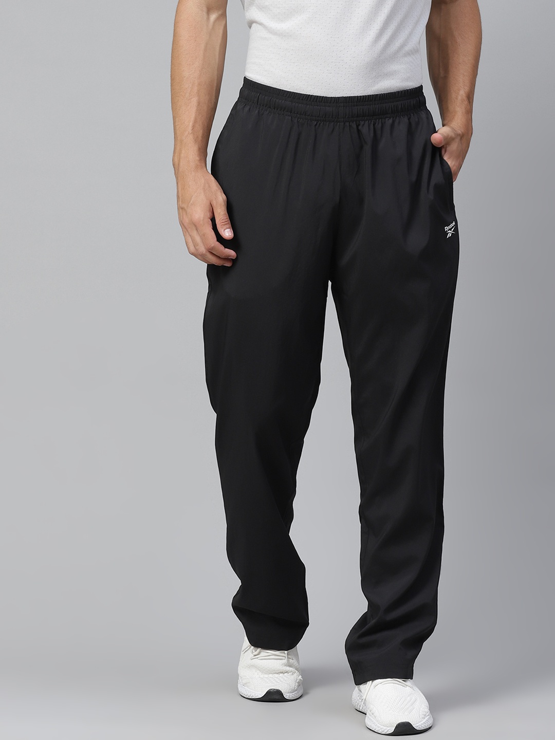 

Reebok Men Black Solid Regular Fit Speedwick Track Pants
