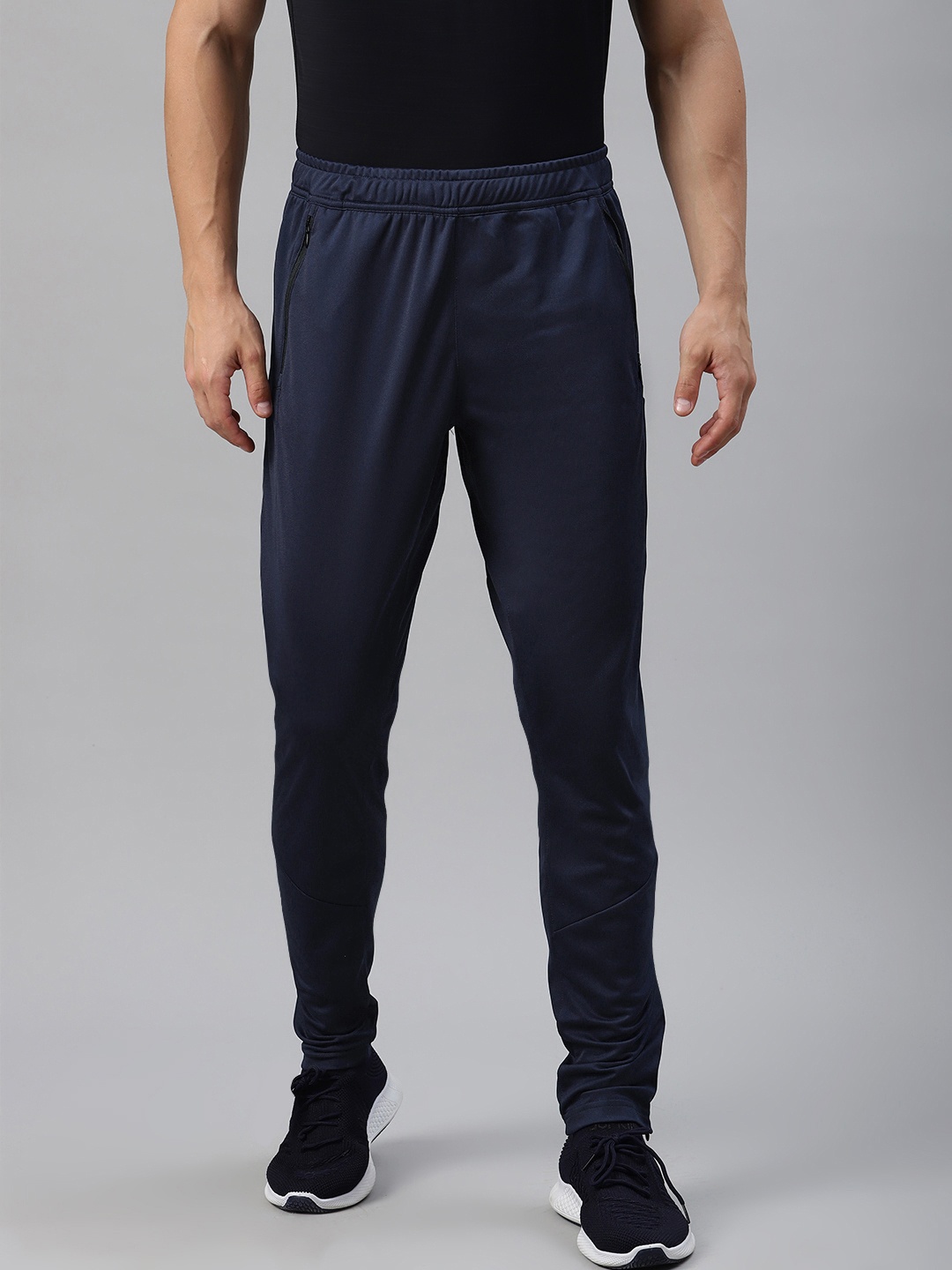 

Reebok Men Navy Blue Solid Regular Fit Workout Training Track Pants