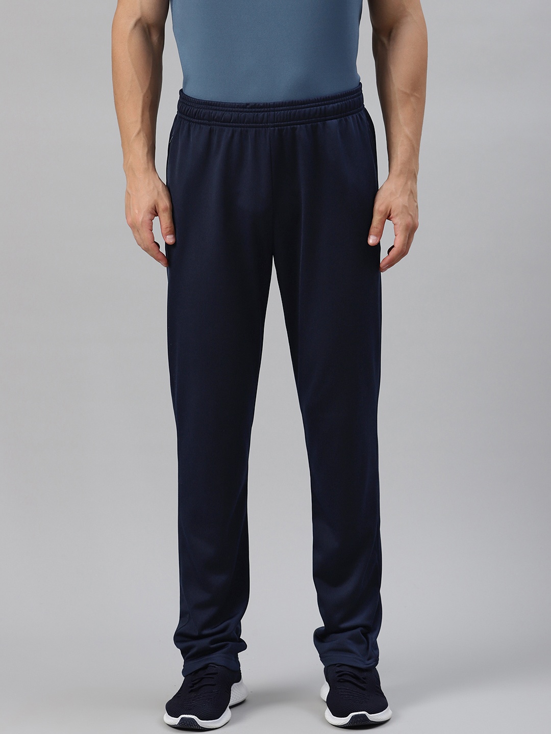 

Reebok Men Navy Blue Solid Training Knit Pants