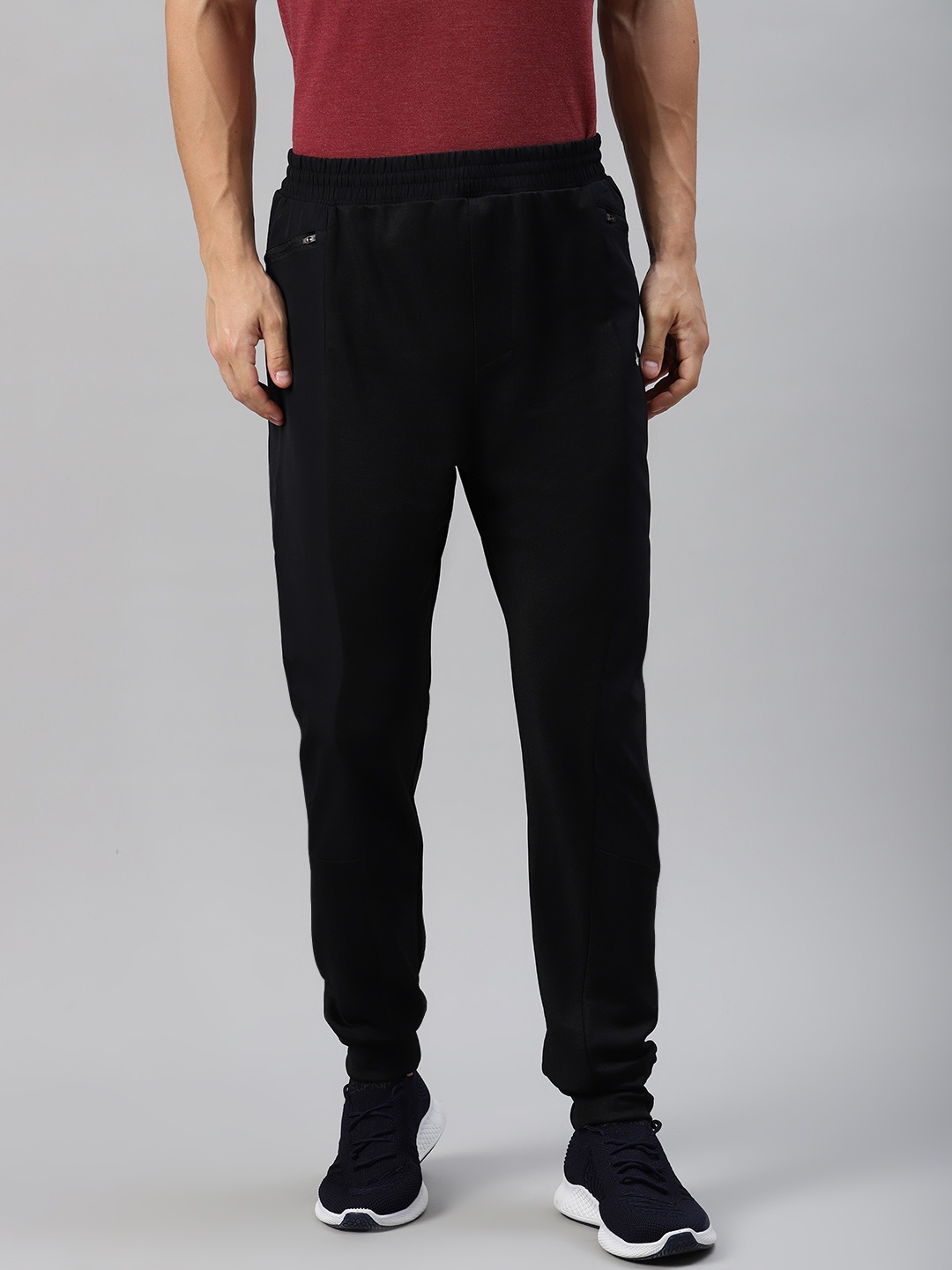 

Reebok Men Black Solid Knit Woven Joggers