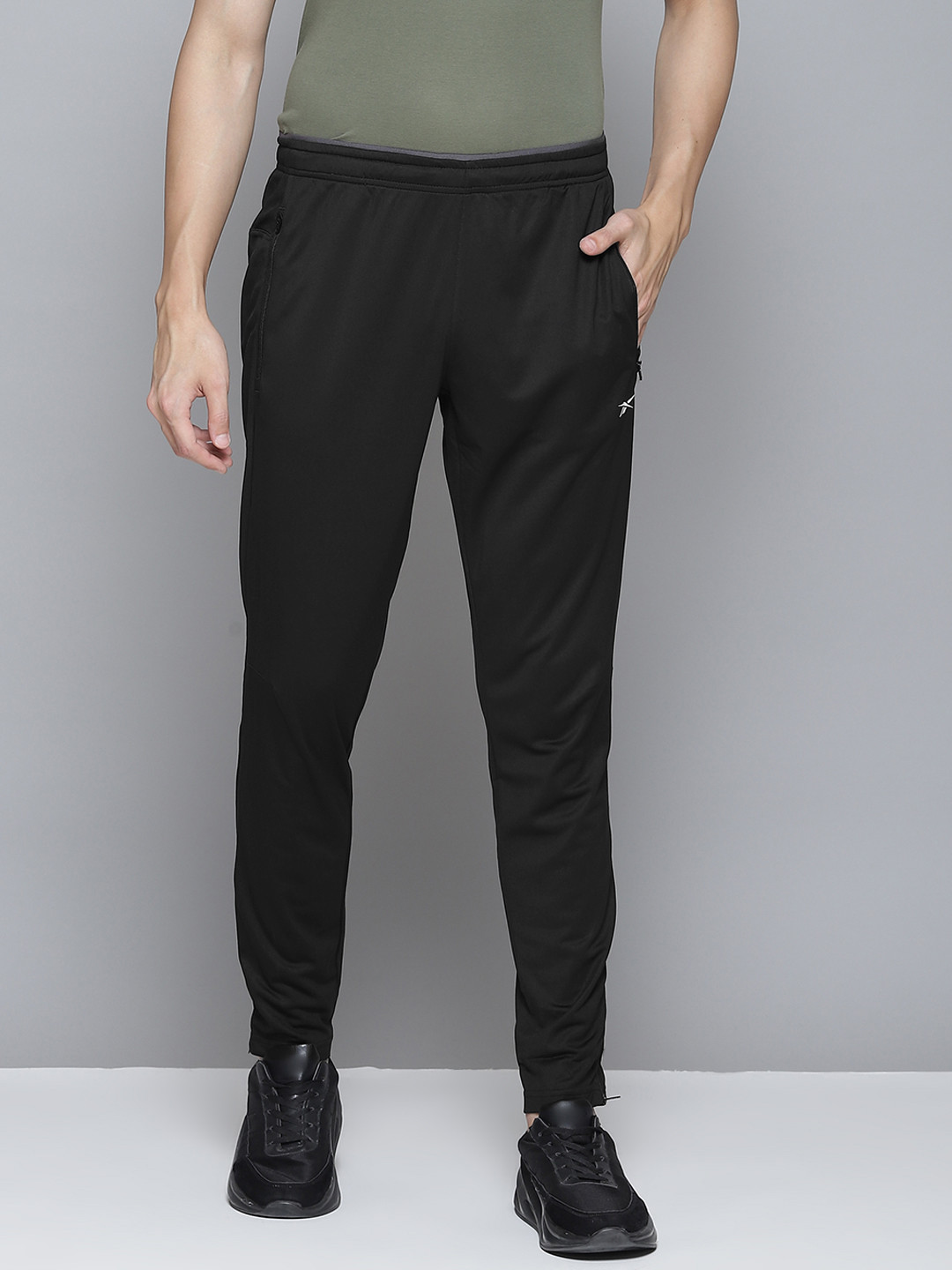 

Reebok Men Black Solid WOR SL Track Pants