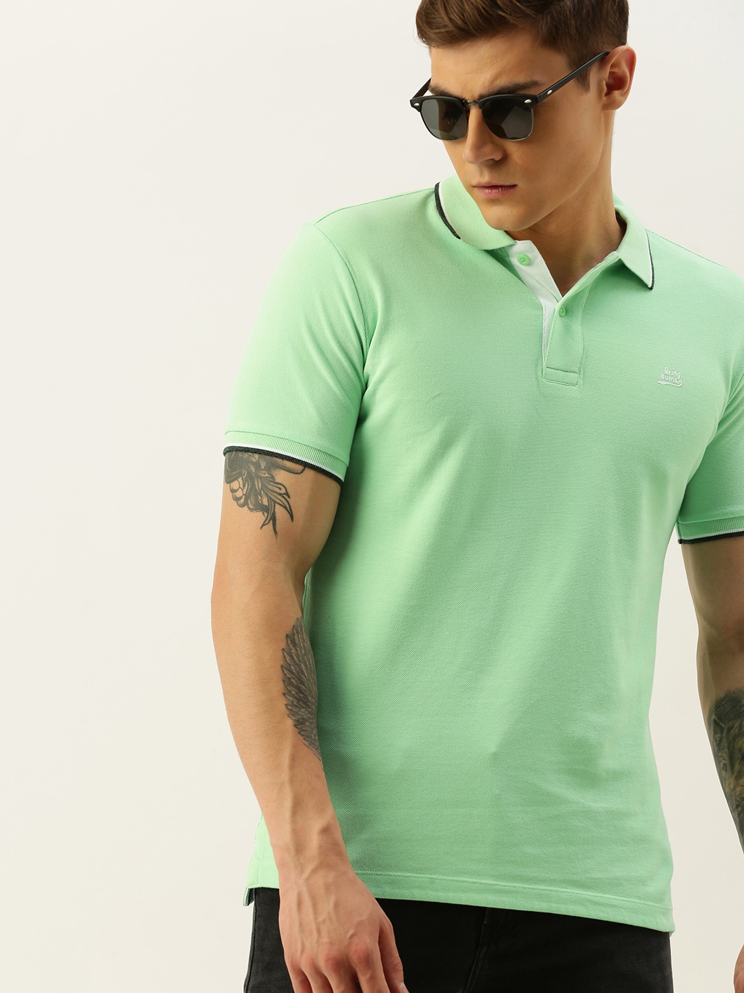 

Being Human Men Green Solid Polo Collar Pure Cotton T-shirt