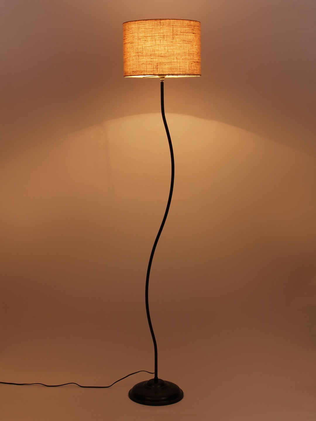 

Devansh Beige Solid Curvy Novelty Lamp