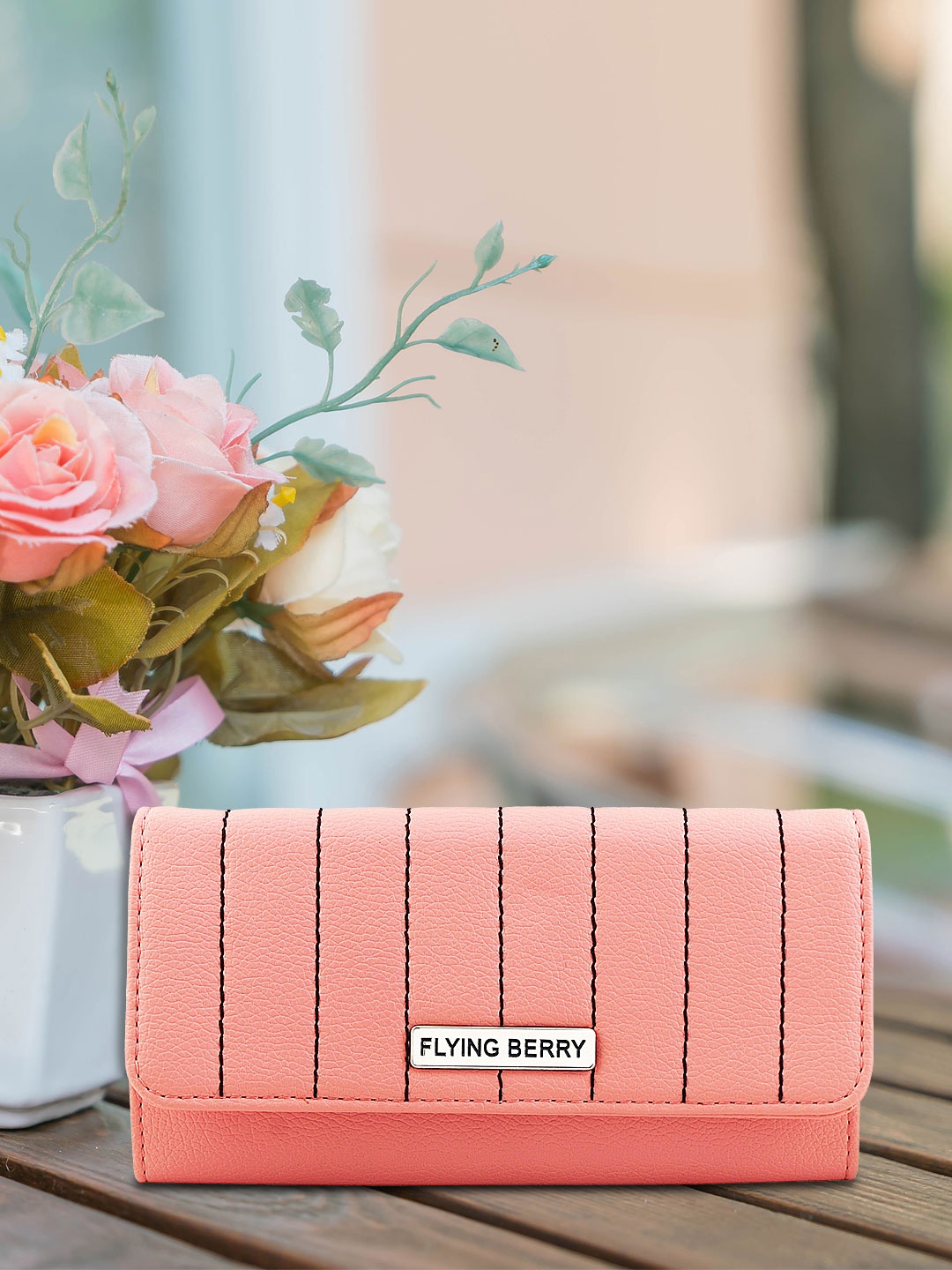 

FLYING BERRY Peach-Coloured Solid Clutch