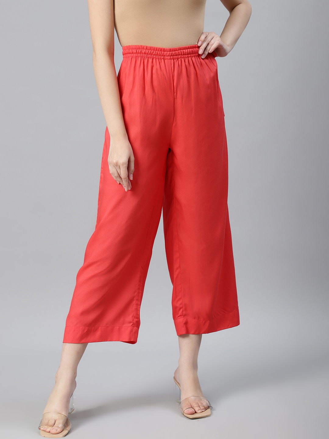 

Anubhutee Women Coral Orange Solid Straight Cropped Palazzos