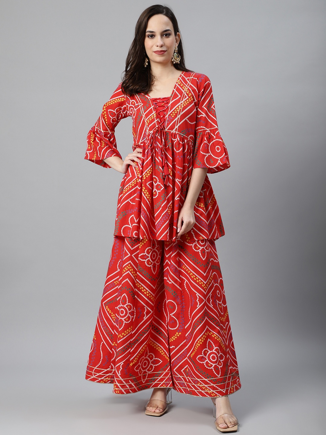 

Anubhutee Women Red & Off-White Pure Cotton Bandhani Print Tunic with Palazzos