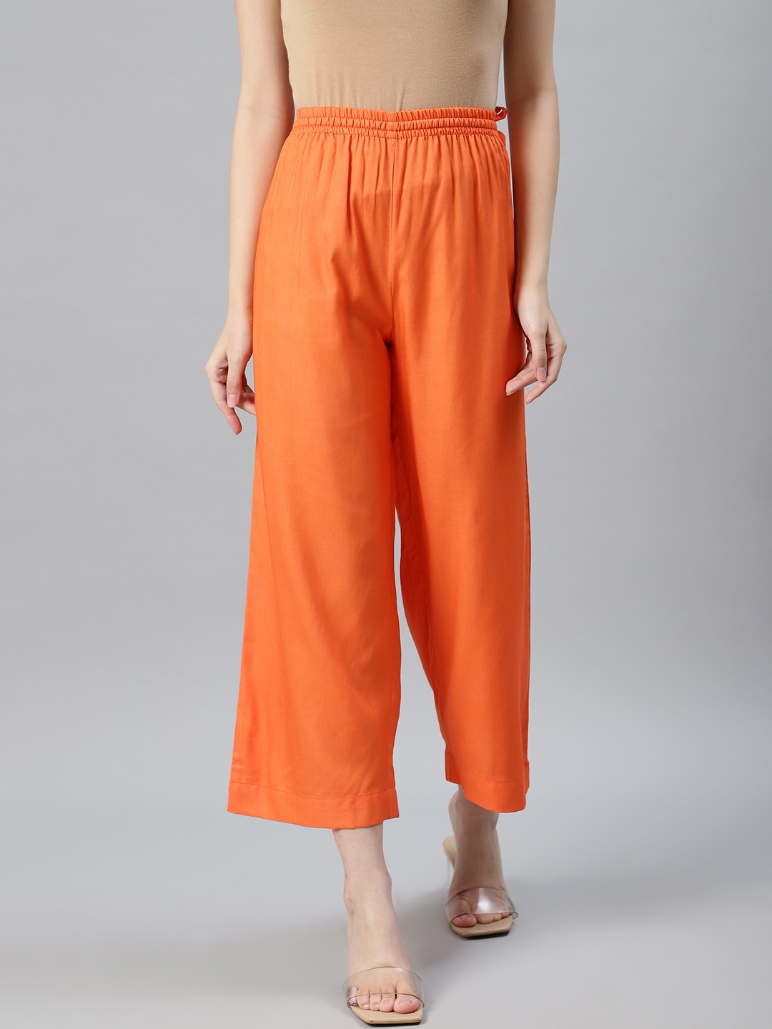 

Anubhutee Women Orange Solid Straight Cropped Palazzos