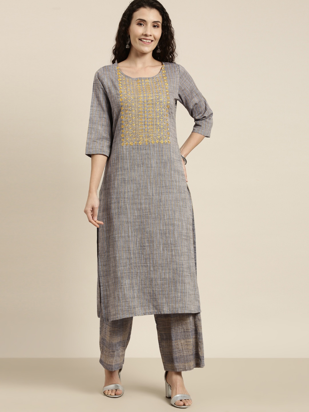 

Vishudh Women Grey Yoke Design Kurti with Palazzos