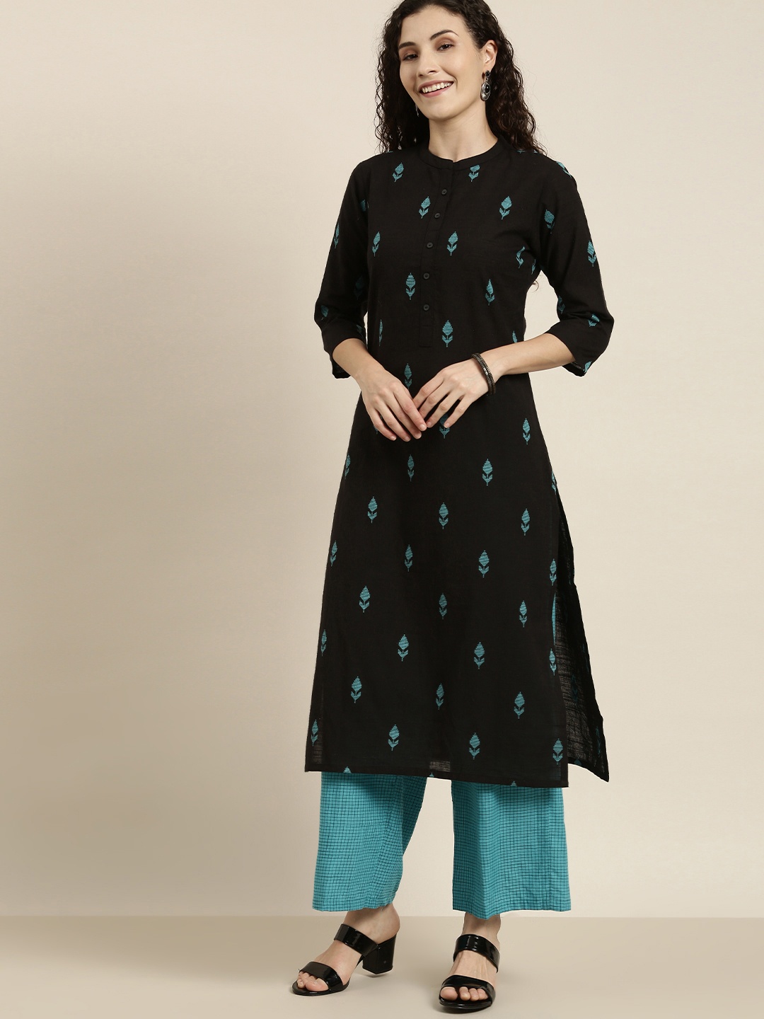 

Vishudh Women Black Printed Kurta with Palazzos