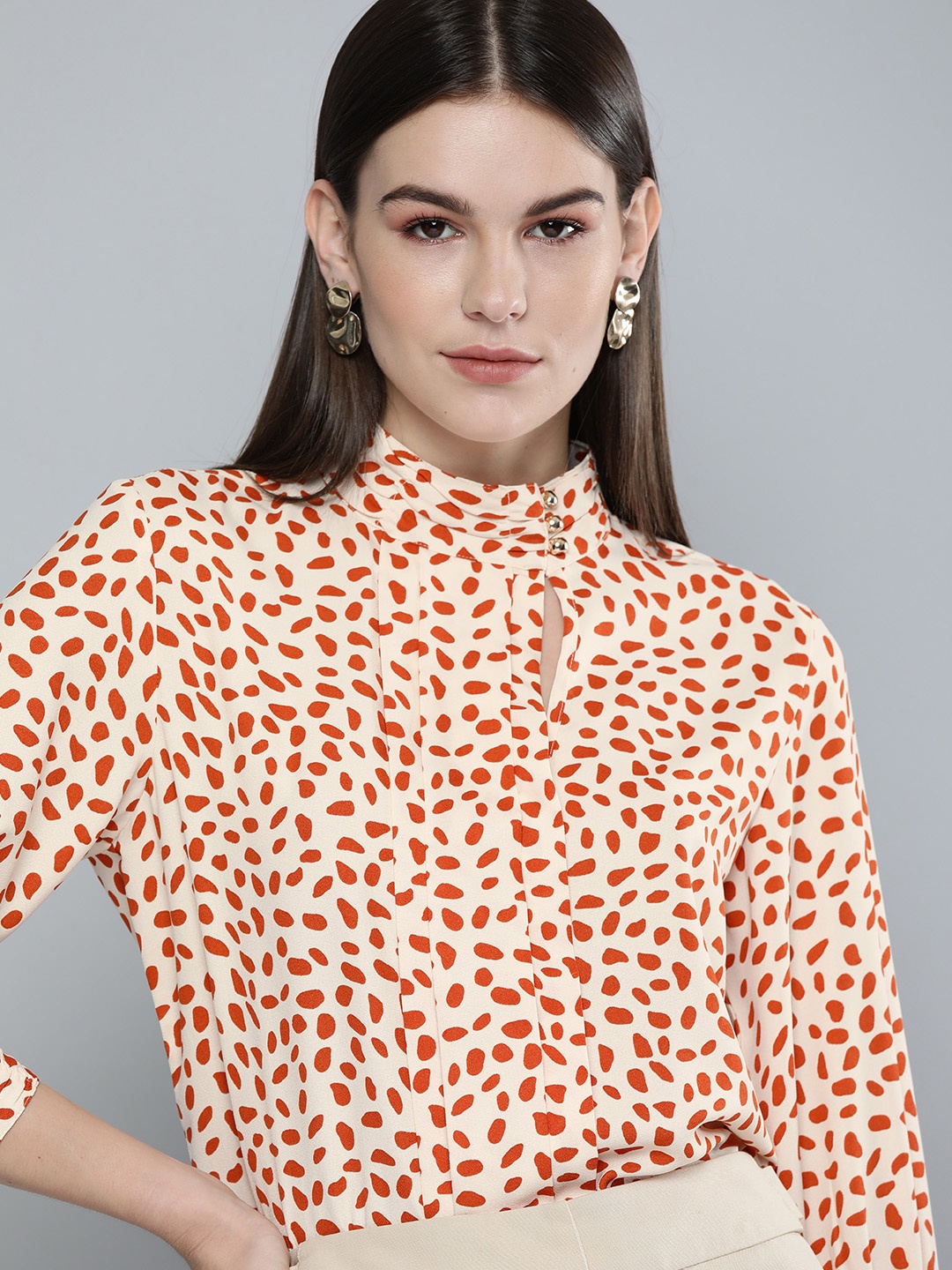 

Chemistry Cream-Coloured & Red Printed Top with Smocked Neck & Cuff