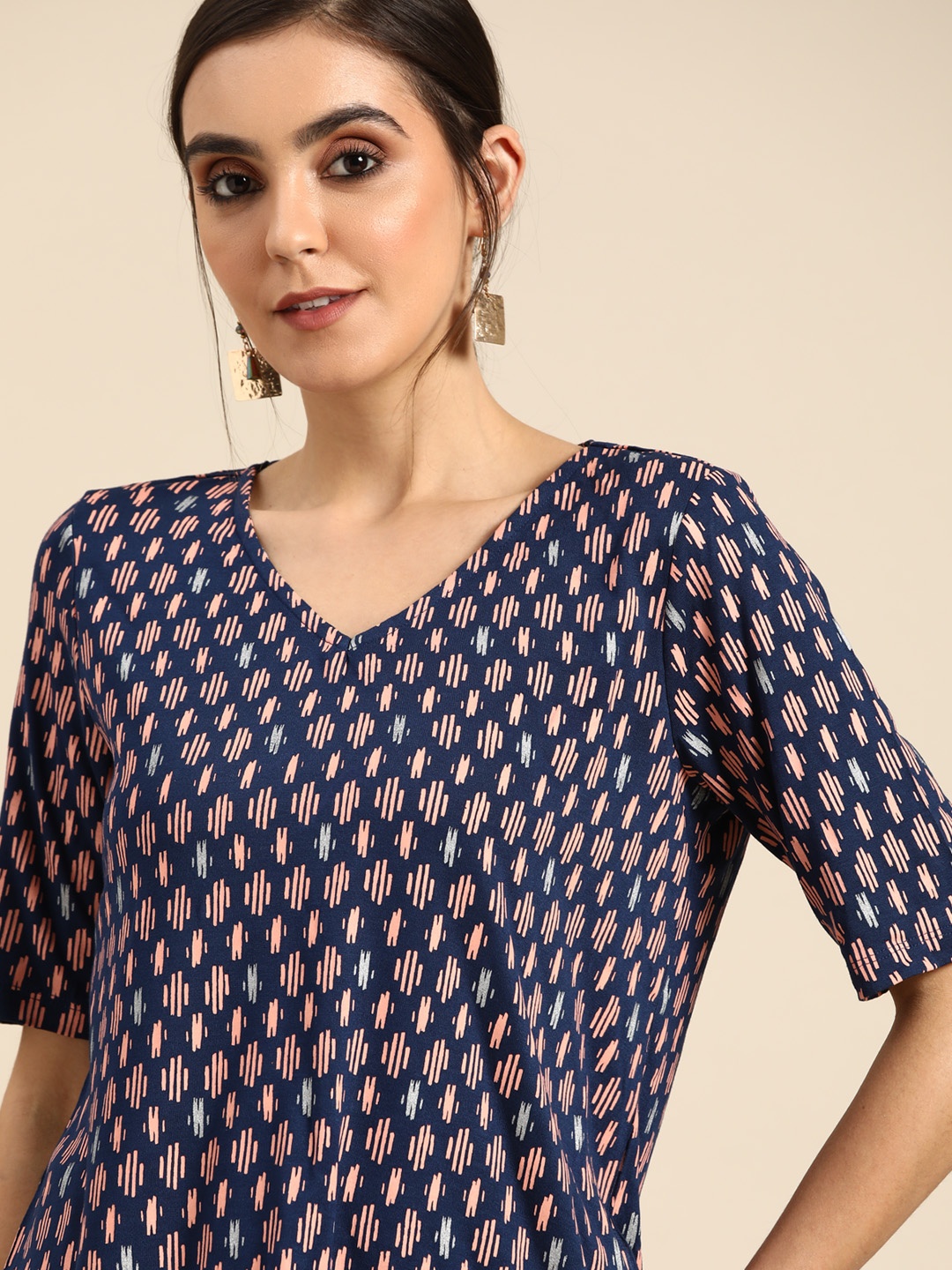 

all about you Women Navy Blue & Peach-Coloured Printed V-Neck T-shirt