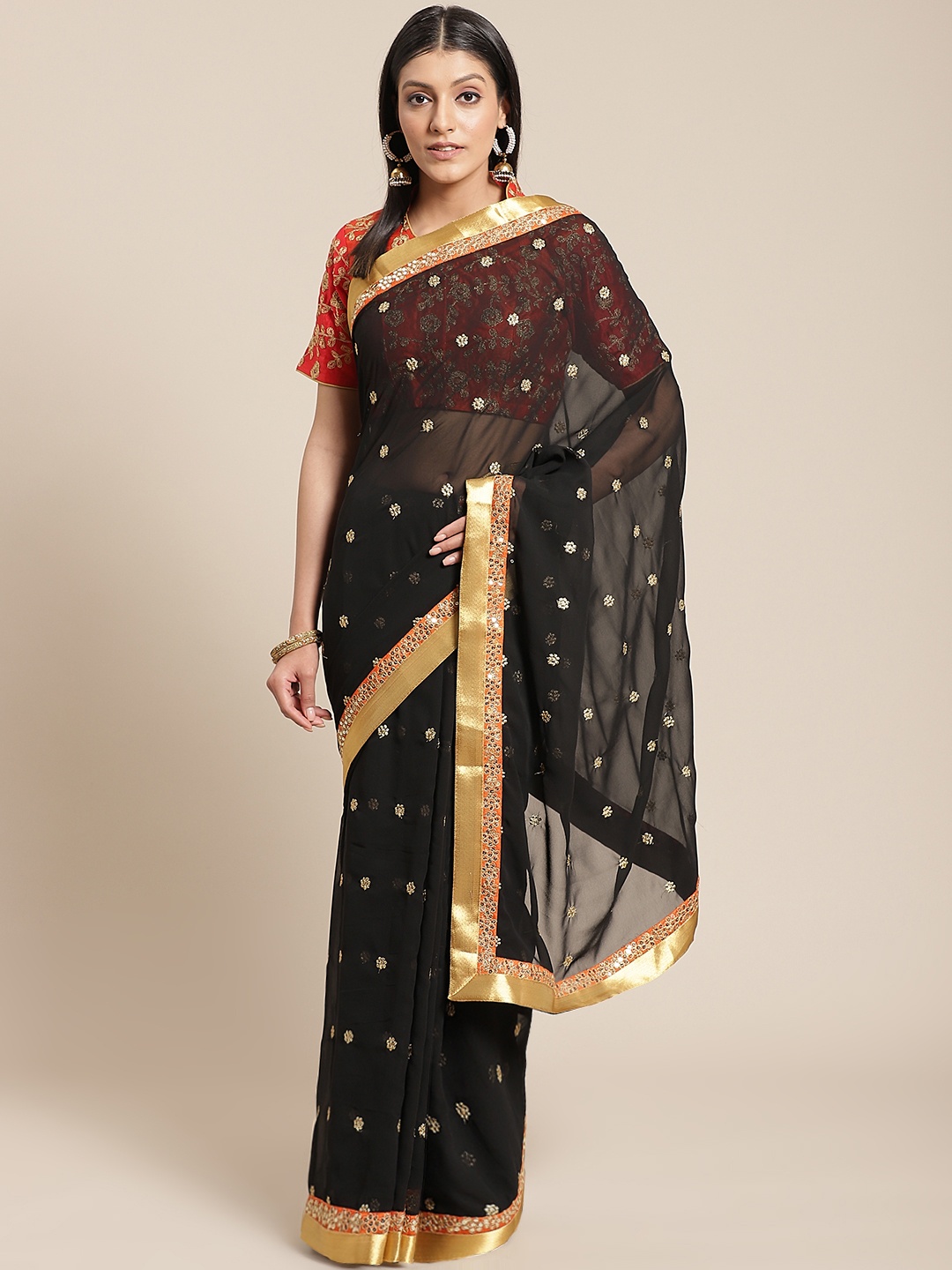 

Chhabra 555 Black & Golden Embroidered Saree