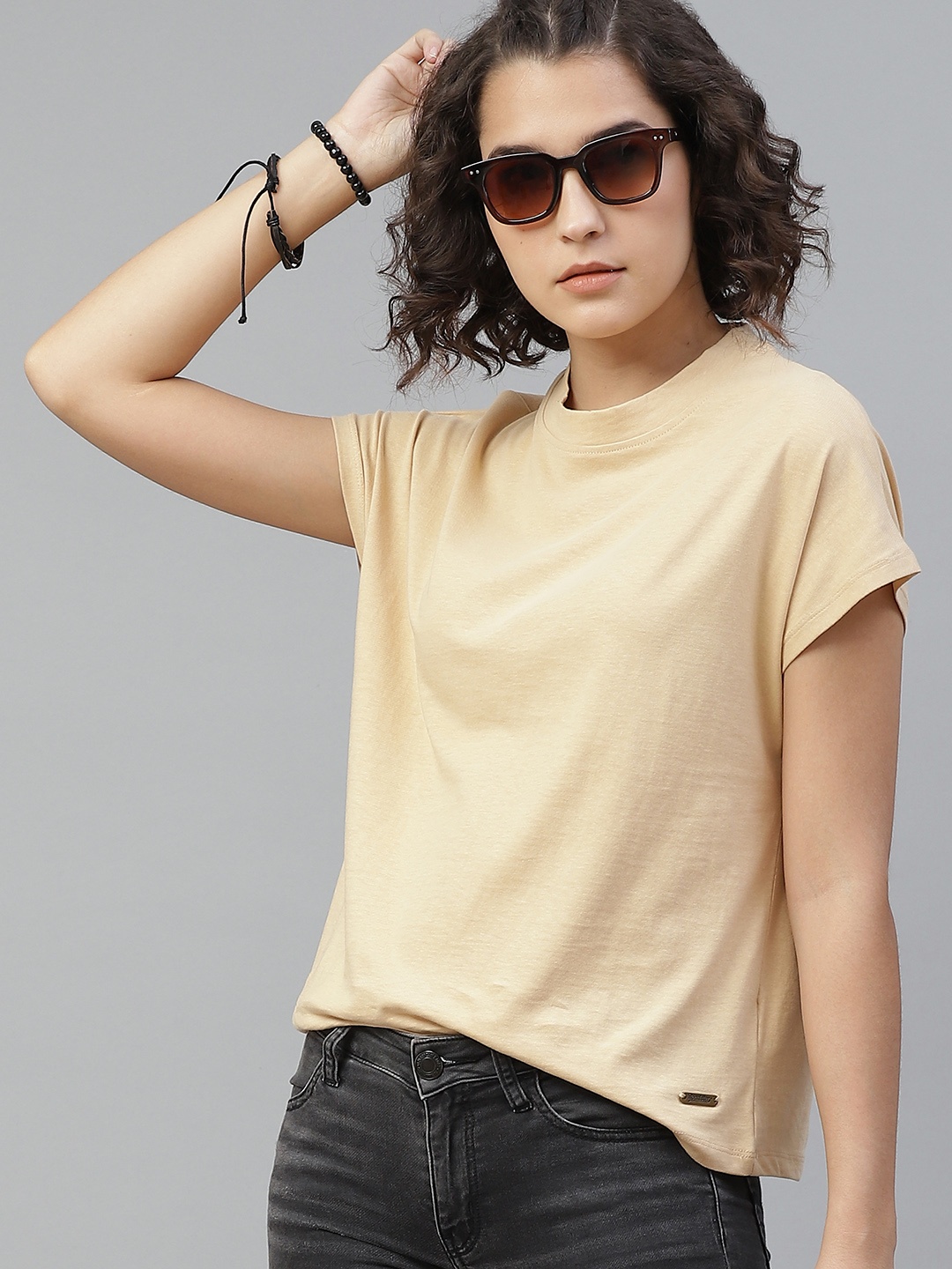 

The Roadster Lifestyle Co Women Beige Cotton Solid Round Neck Pure Cotton T-shirt