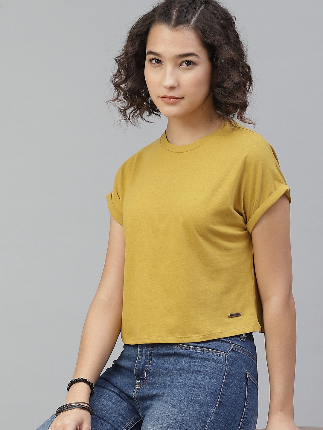 

The Roadster Lifestyle Co Women Mustard Yellow Solid Round Neck Pure Cotton T-shirt