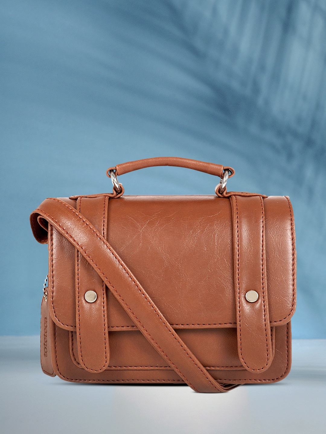 

Toteteca Tan Textured Sling Bag