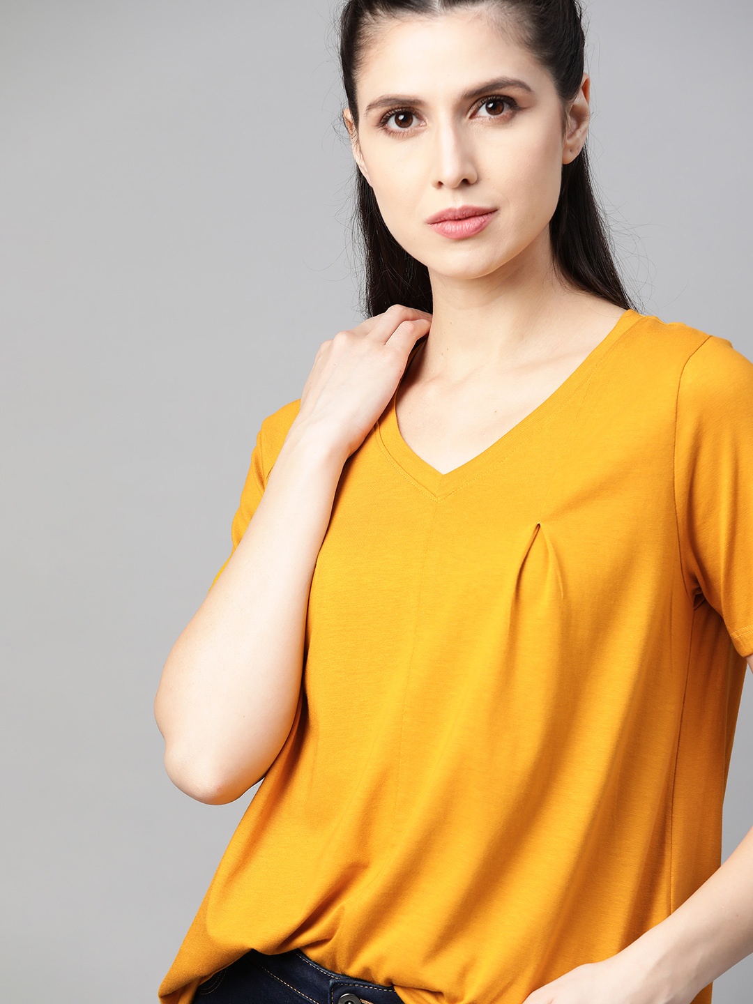 

The Roadster Lifestyle Co Women Mustard Yellow Solid Pleated Regular Top