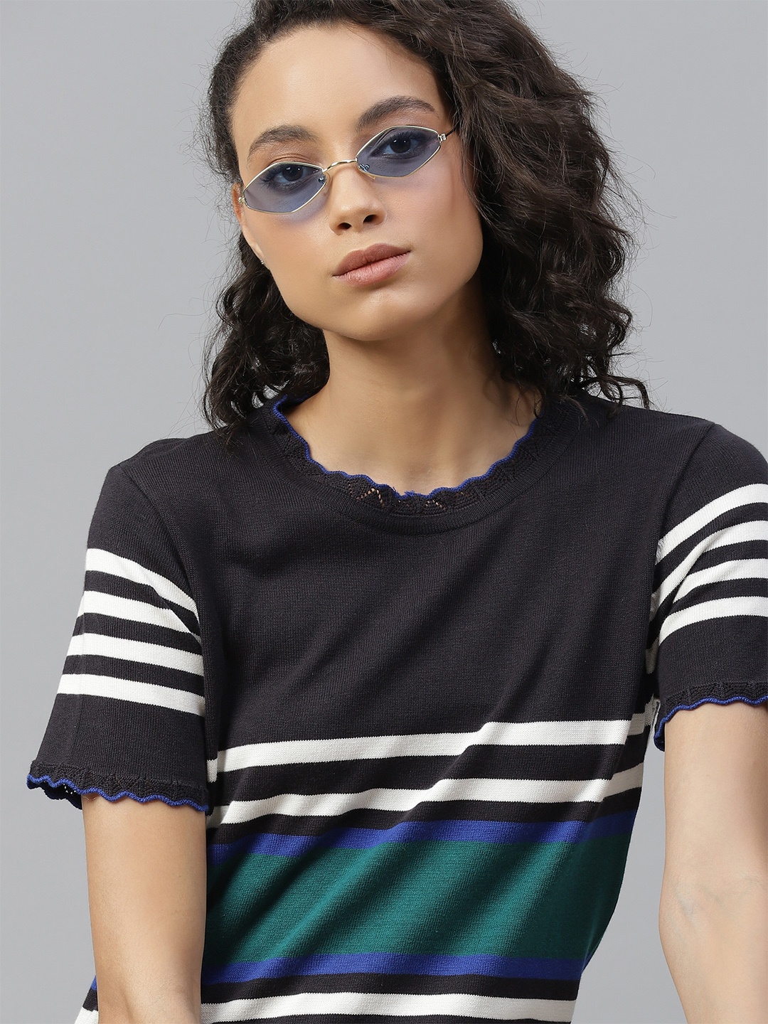 

The Roadster Lifestyle Co Navy Blue & White Striped Regular Top With Lettuce Edge