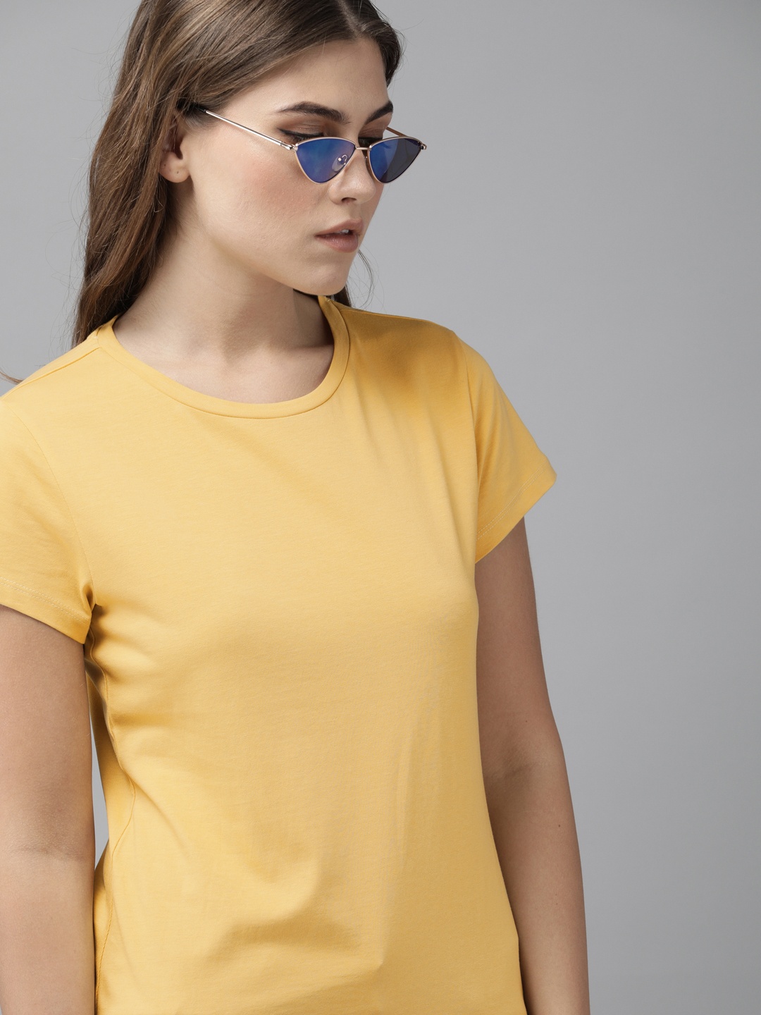 

The Roadster Lifestyle Co Women Yellow Solid Round Neck Pure Cotton T-shirt