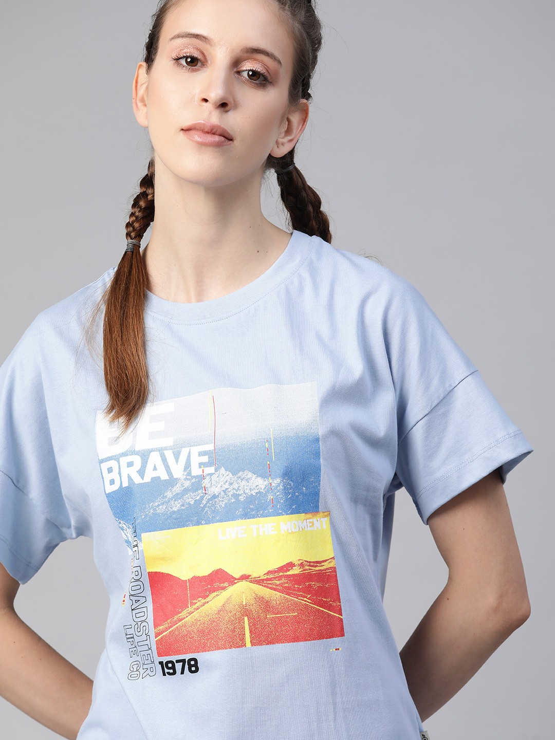 

The Roadster Lifestyle Co Women Blue Orange Graphic Printed Pure Cotton T-shirt
